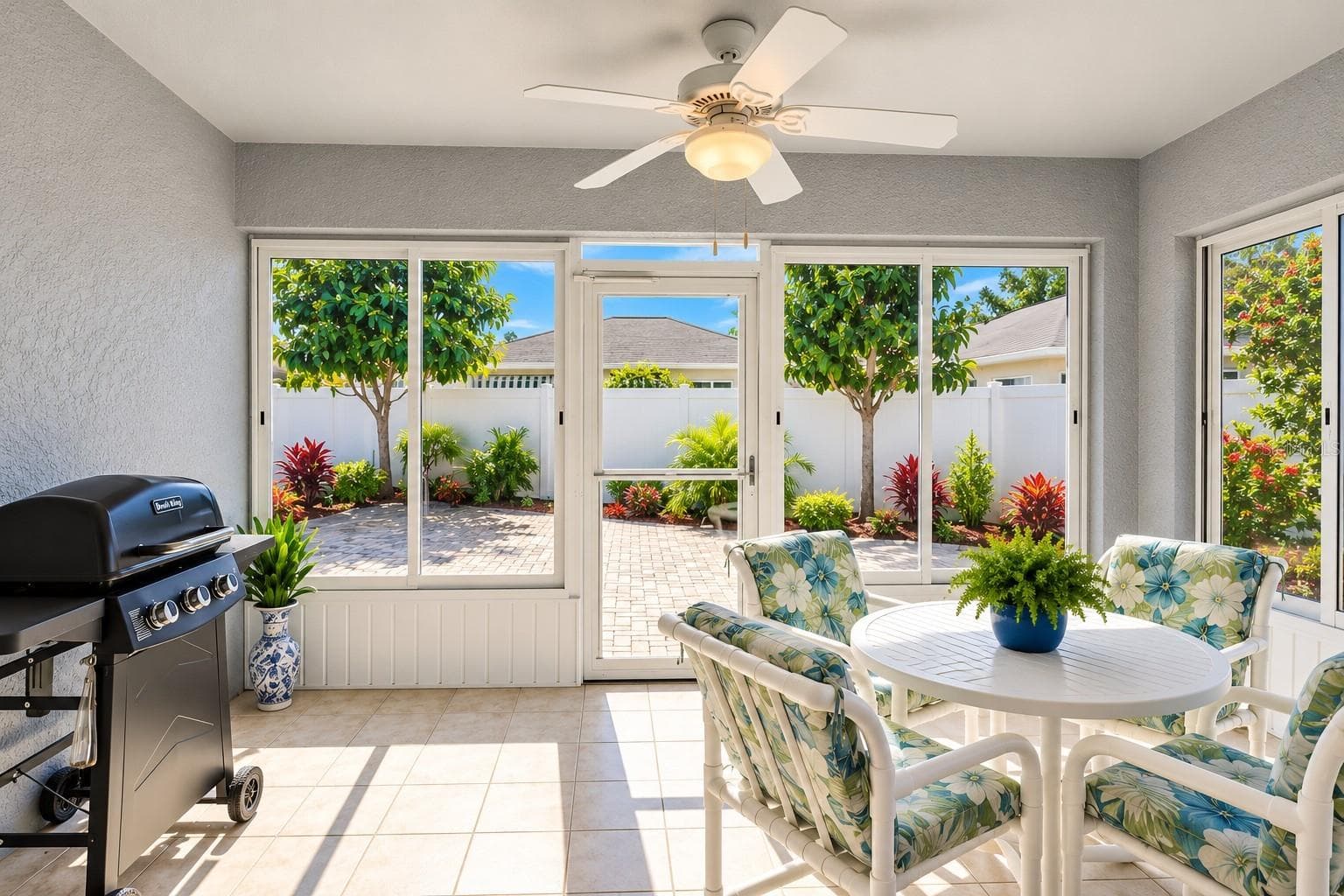 Florida features tile flooring and a ceiling fan - 3437 GRENVILLE DR, WINTER HAVEN