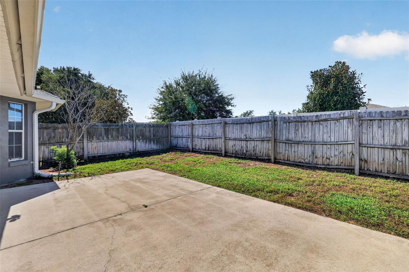 Patio with fenced backyard - 4460 MARSH HARBOR DR, TAVARES