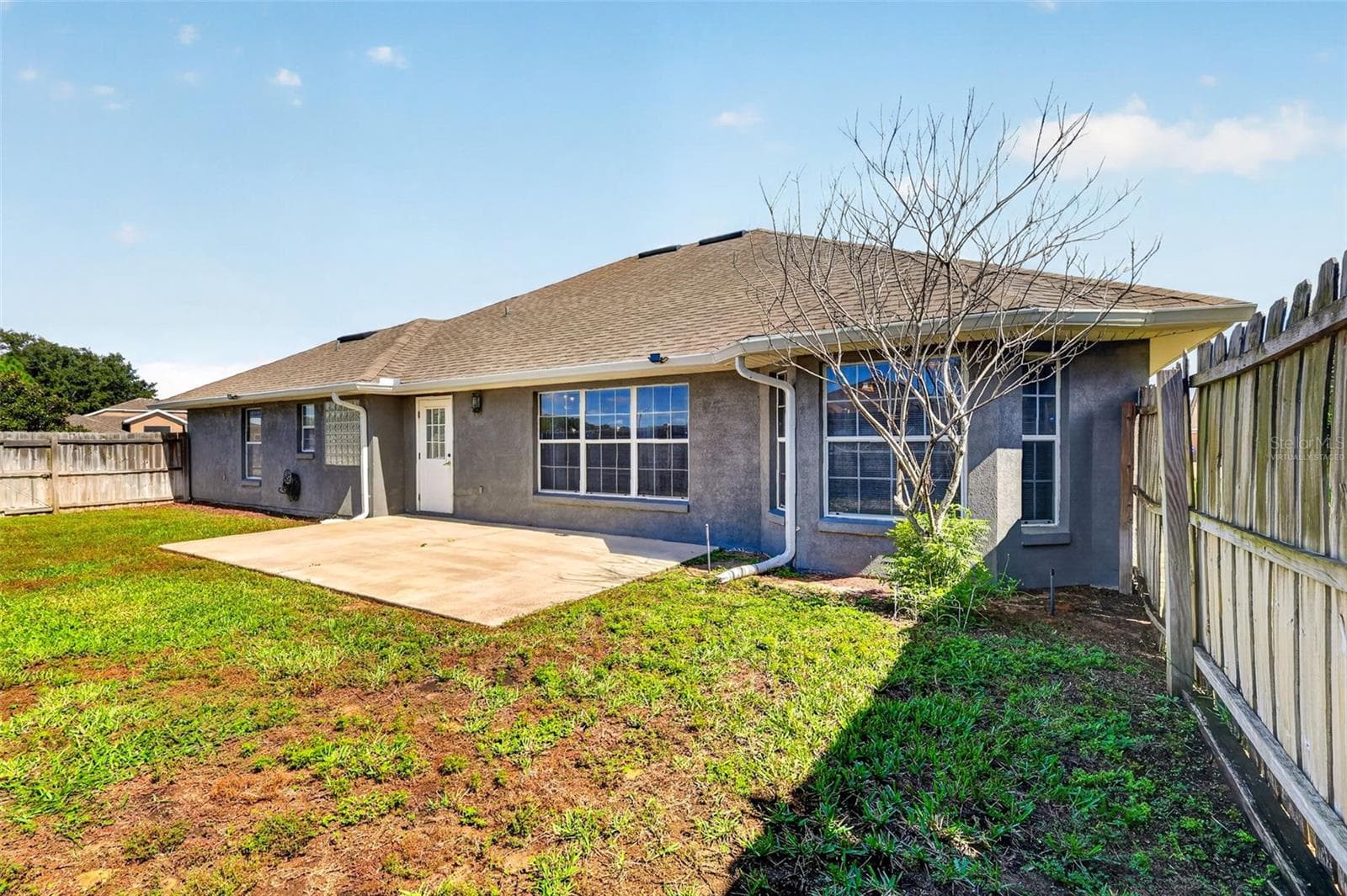 *virtually staged* Patio with fenced backyard - 4460 MARSH HARBOR DR, TAVARES