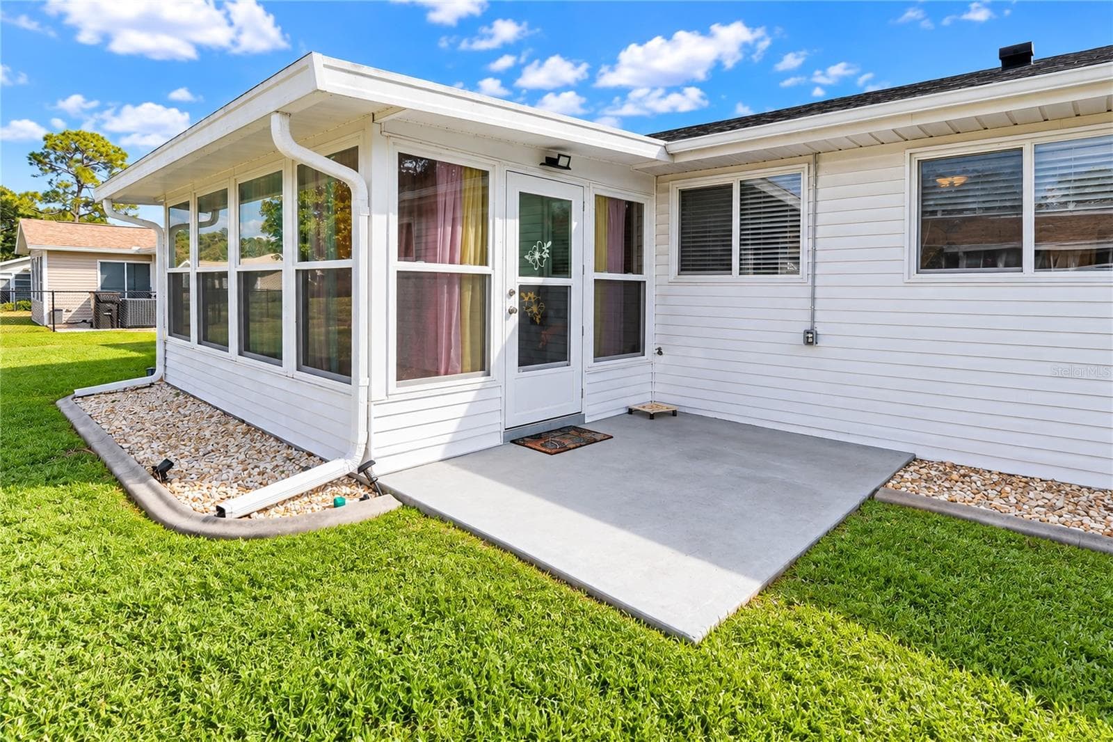 Rear open patio slab for cookouts - 8169 SW 108TH LANE RD, OCALA