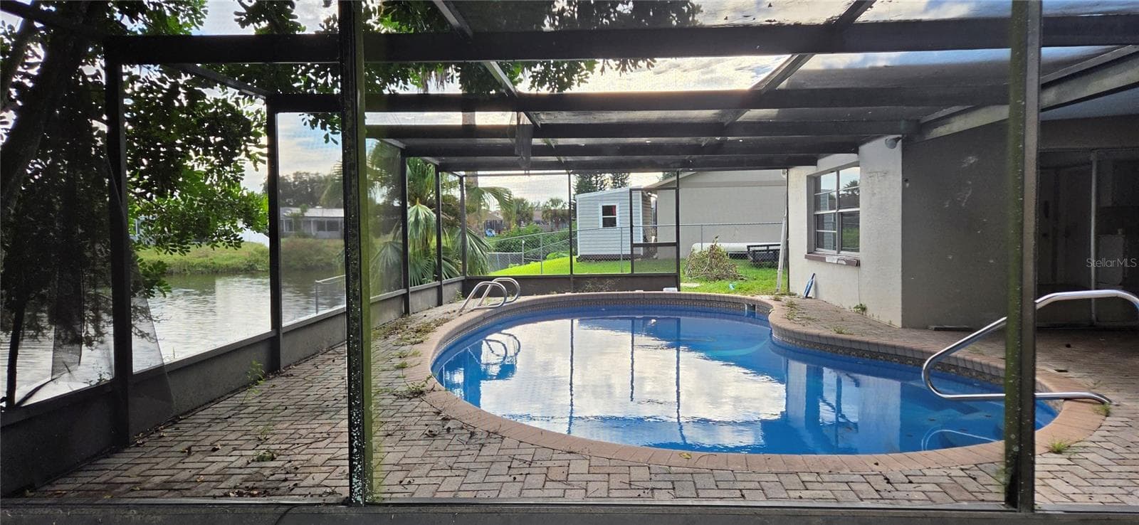 Single Family Residence at 9348 LAKE CHRISTINA LN, PORT RICHEY, photo 2 of 38