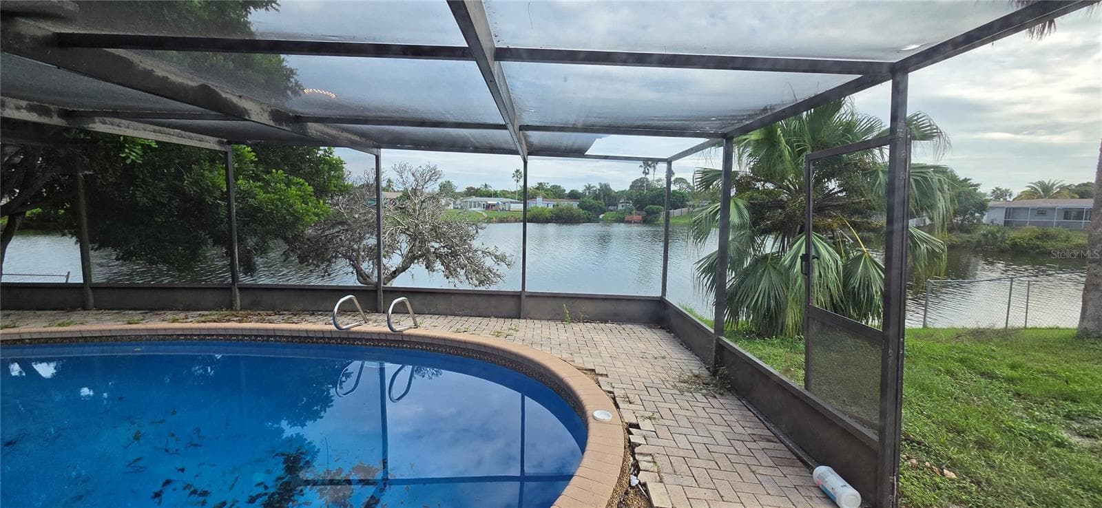 Single Family Residence at 9348 LAKE CHRISTINA LN, PORT RICHEY, photo 3 of 38