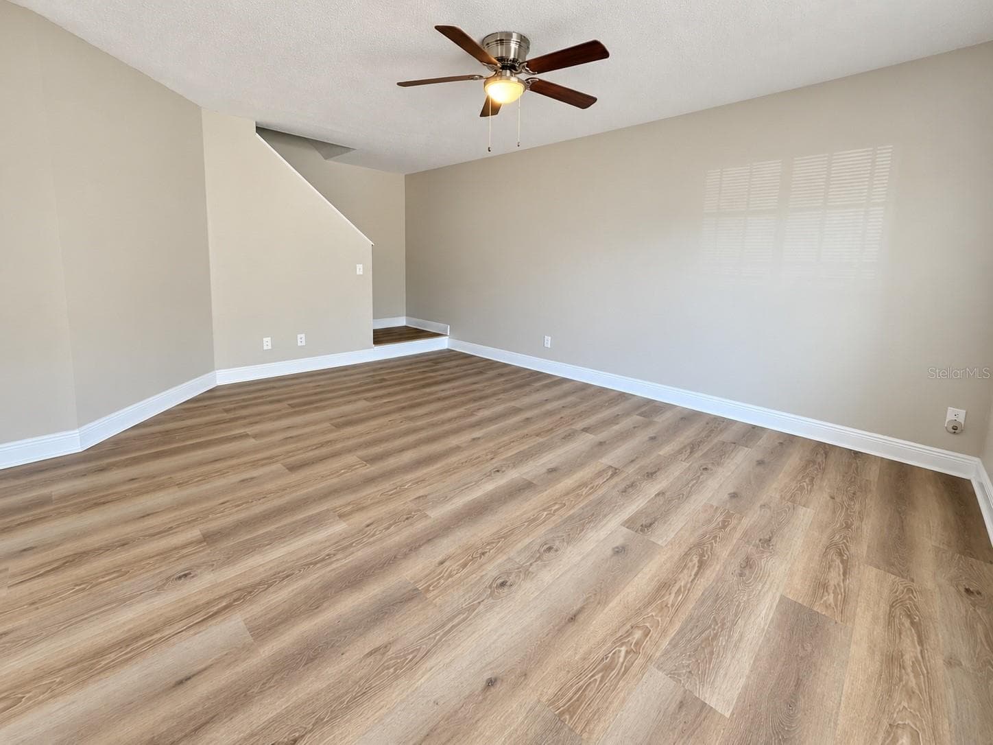 Living Room - New Flooring and Lighting - 7338 E BANK DR, TAMPA