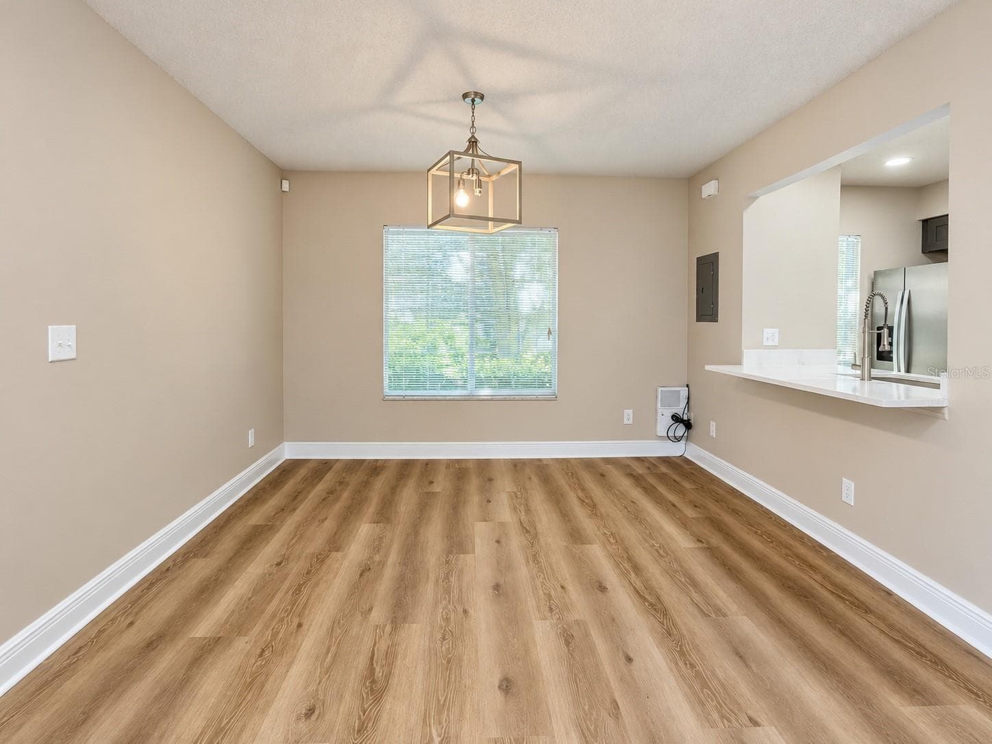 Dining Area - New Flooring and Lighting - 7338 E BANK DR, TAMPA