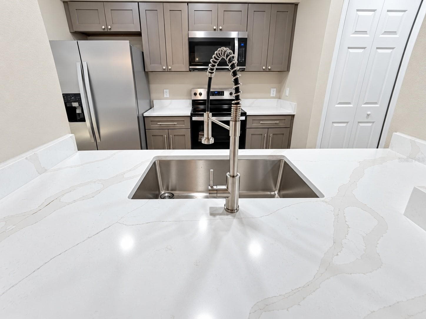 Kitchen - New Sink, Faucet and Garbage Disposal - 7338 E BANK DR, TAMPA