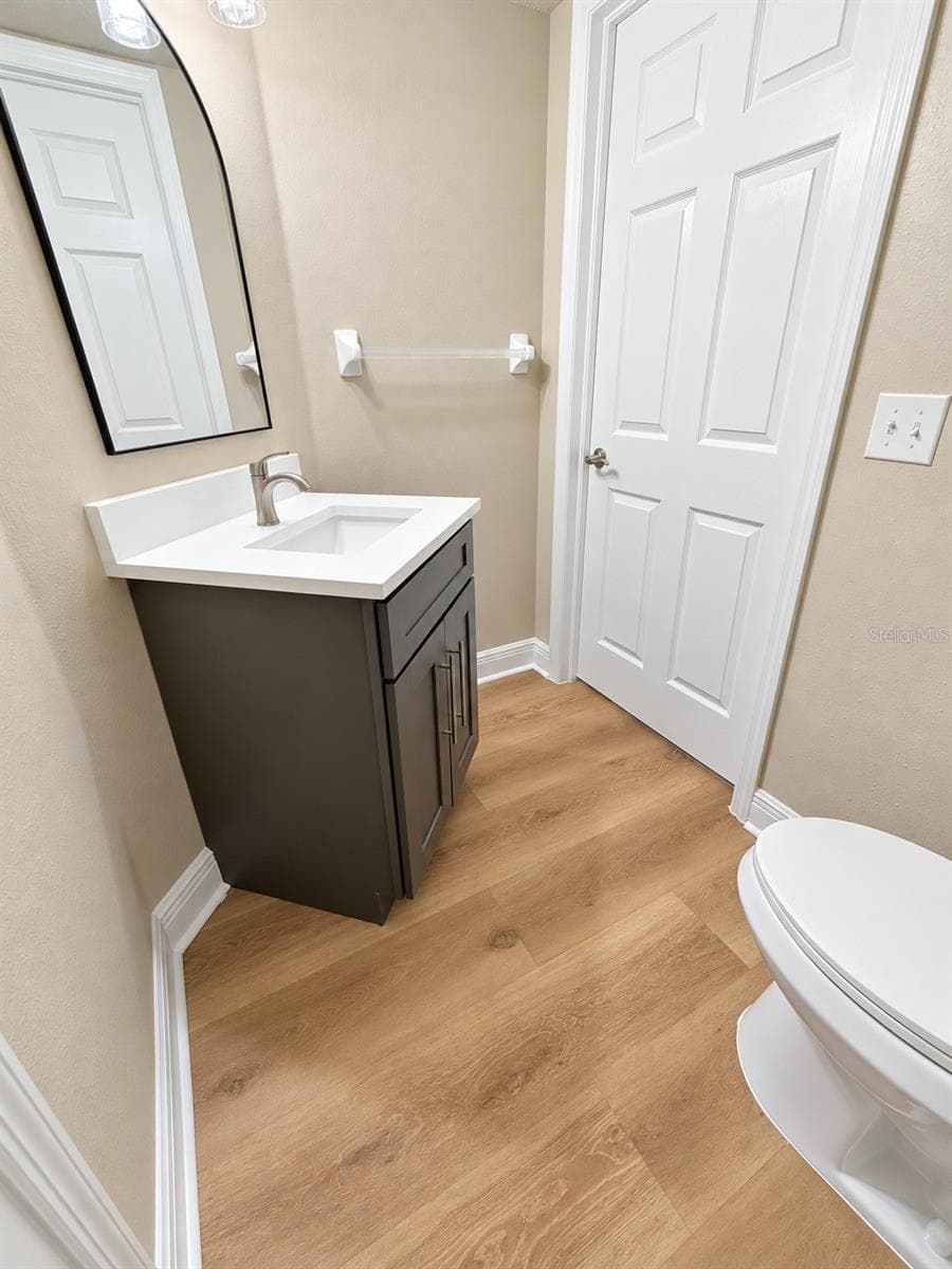 Half Bathroom - New Cabinetry, Stone Countertop and Fixtures - 7338 E BANK DR, TAMPA