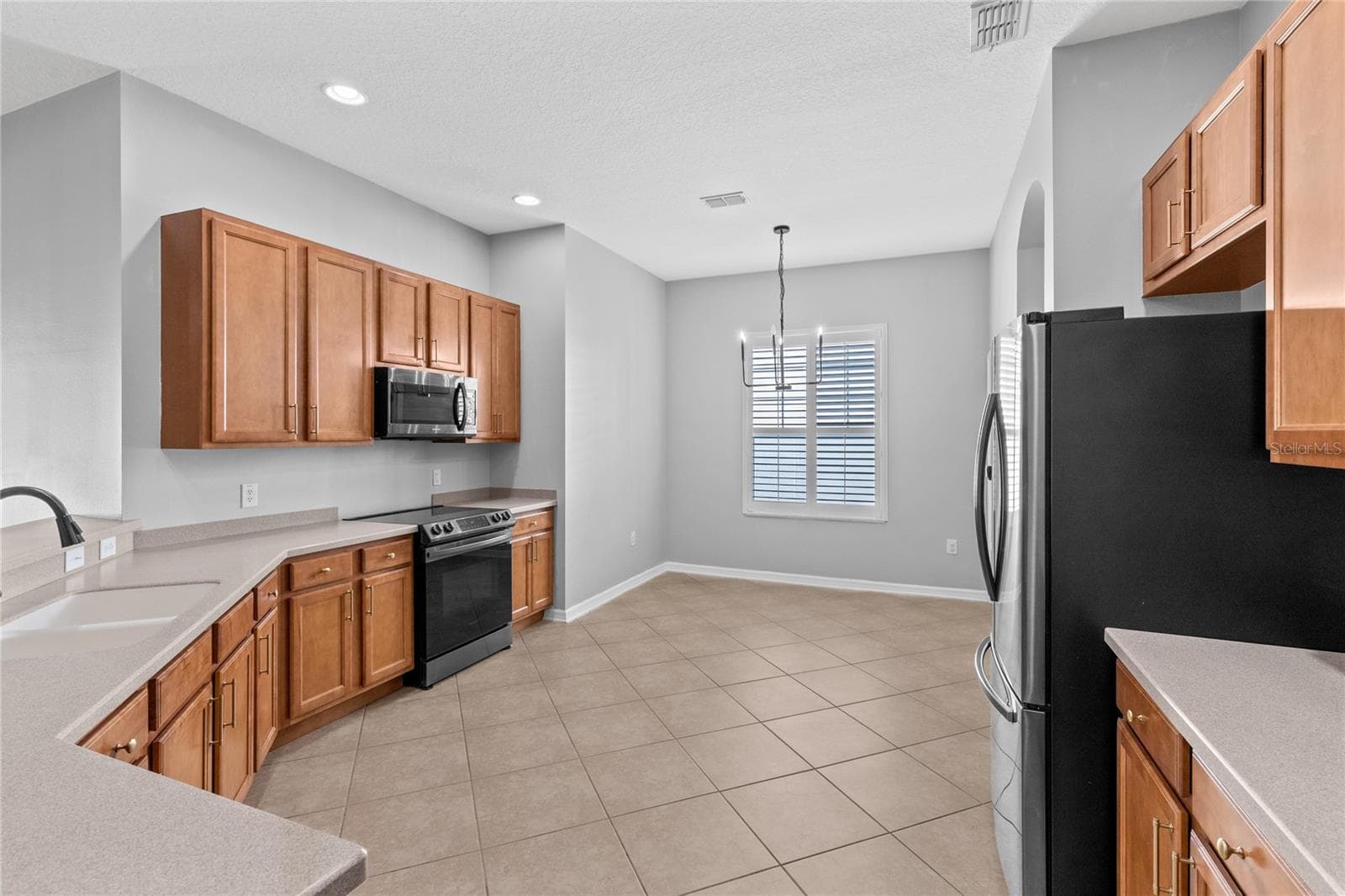 Kitchen with dinette - 3214 BAYFLOWER AVE, HARMONY
