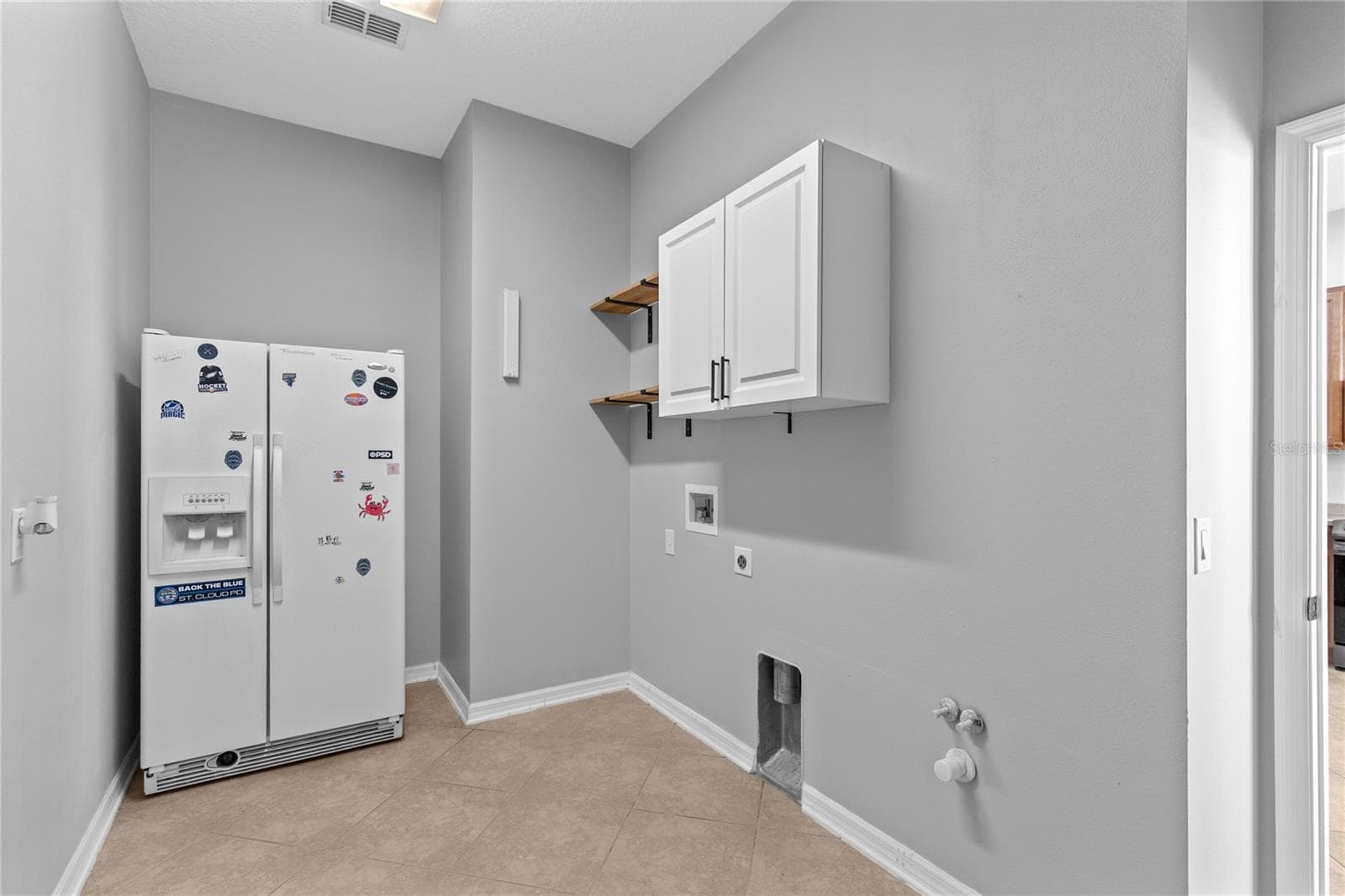 Laundry room - 3214 BAYFLOWER AVE, HARMONY