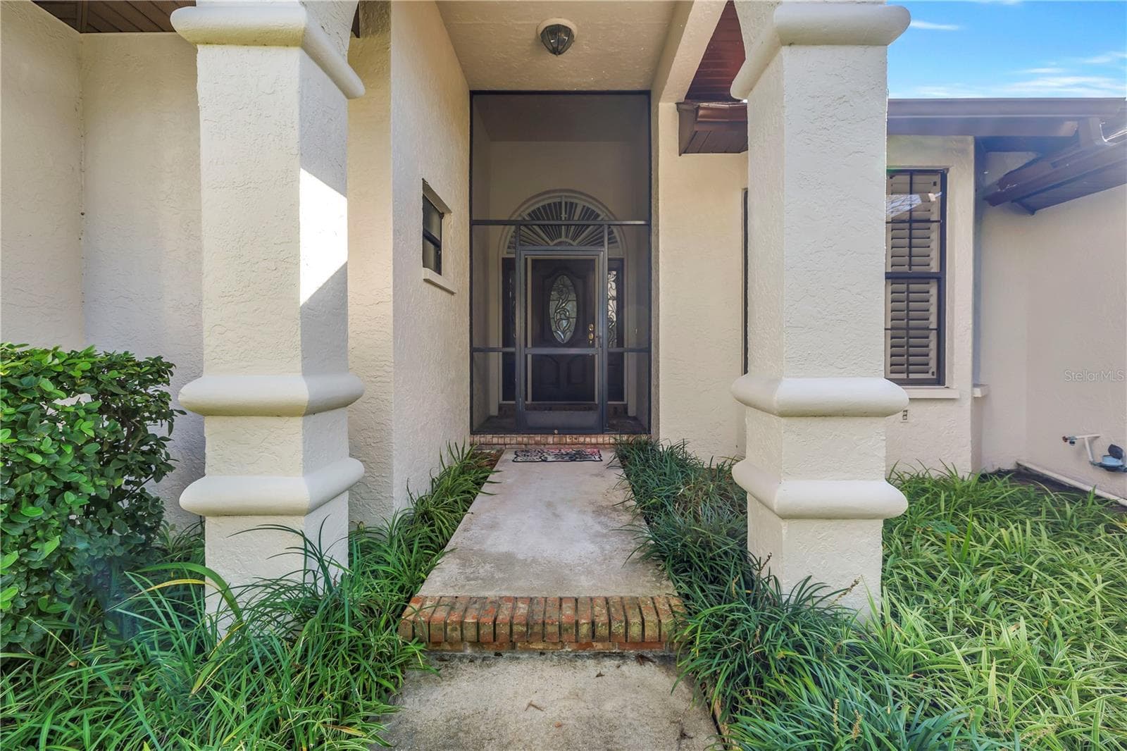 This custom-designed beauty is a one-of-a-kind luxury home that features a super impressive entryway and foyer. - 1186 GASPARILLA DR NE, ST PETERSBURG