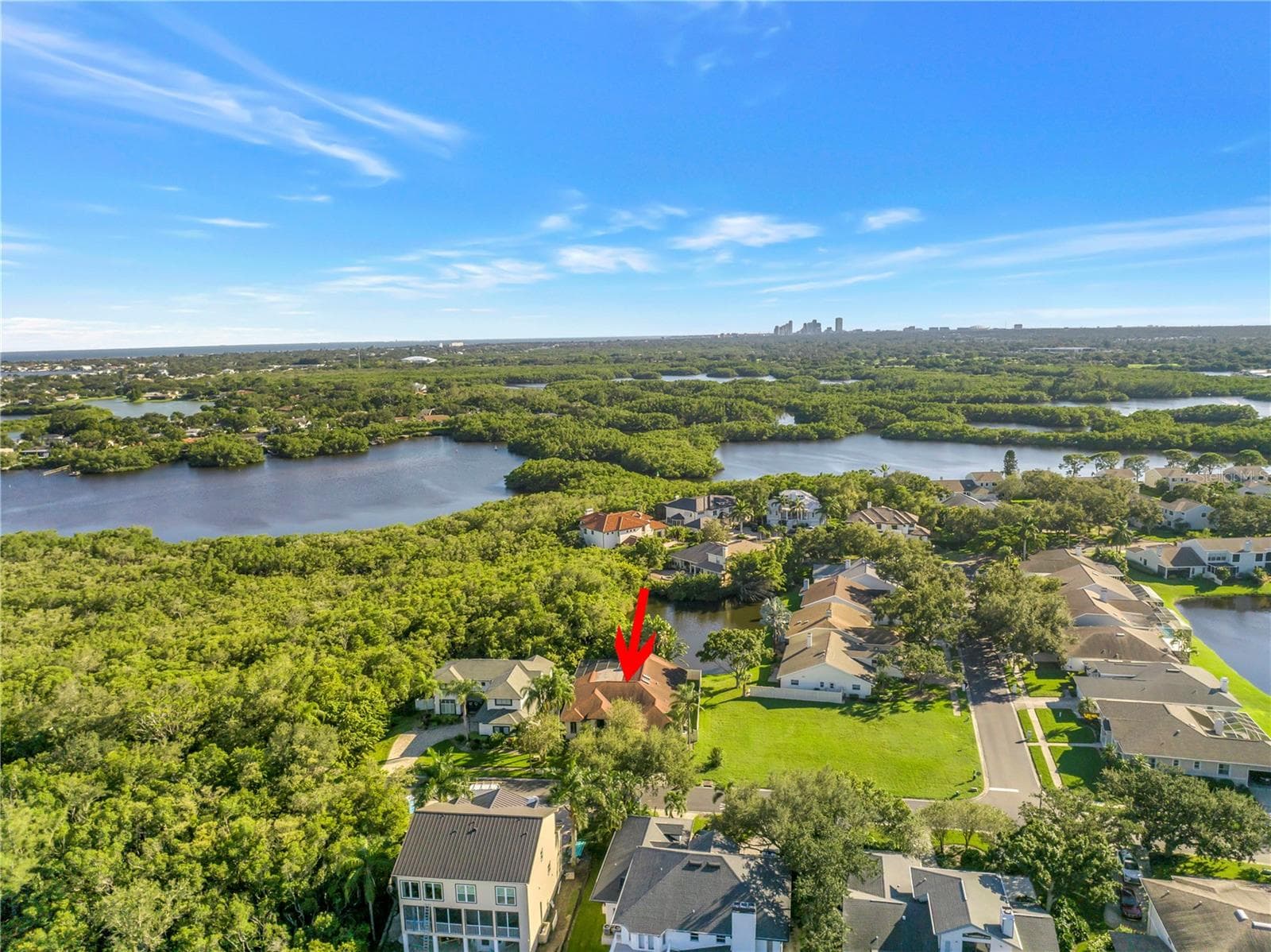 Stunning pristine water views surround this quiet, peaceful neighborhood, all while being just minutes away from the vibrant energy of Downtown St. Pete. - 1186 GASPARILLA DR NE, ST PETERSBURG