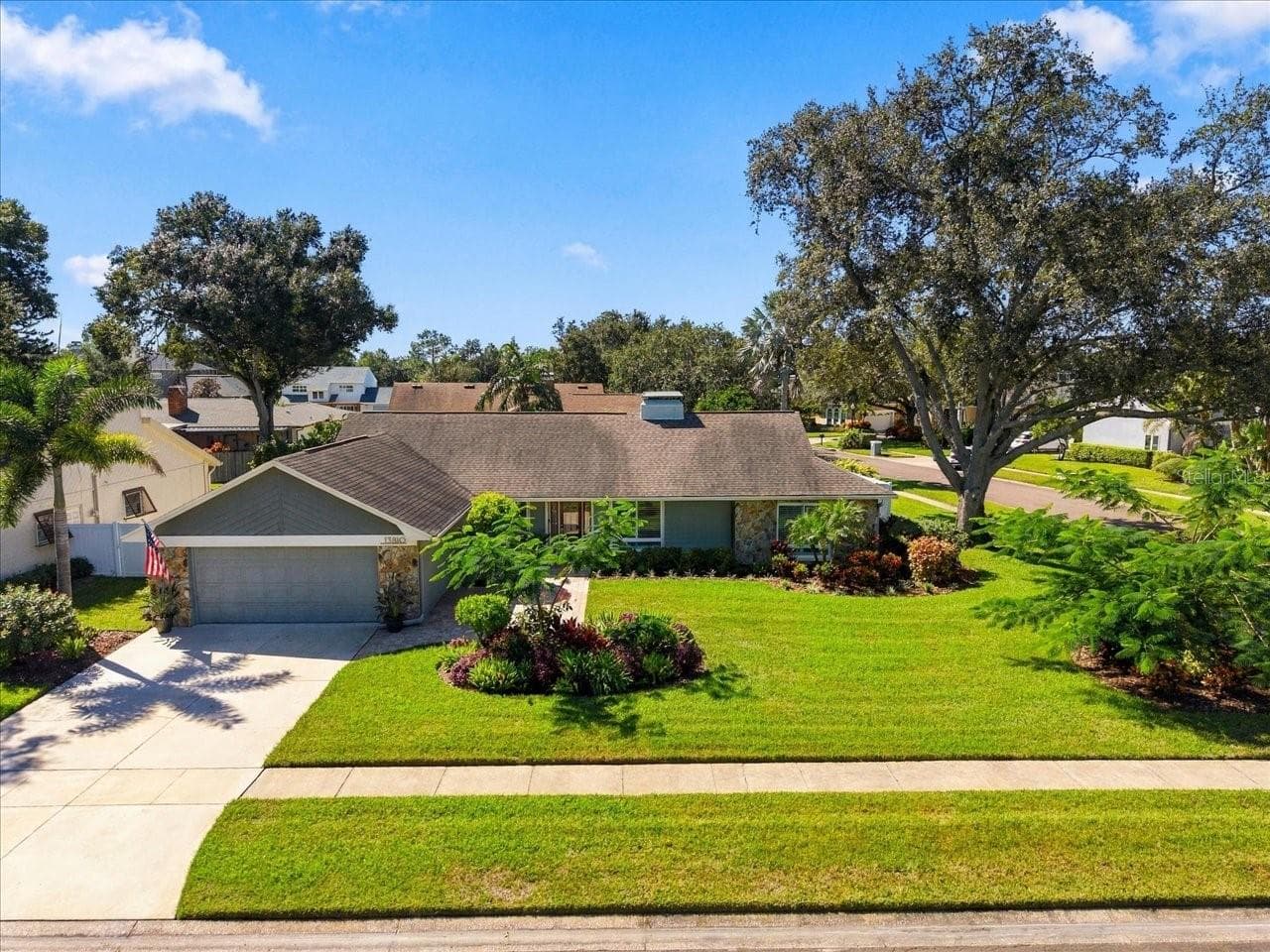 Single Family Residence at 13810 LAKE VILLAGE PL, TAMPA, photo 2 of 45