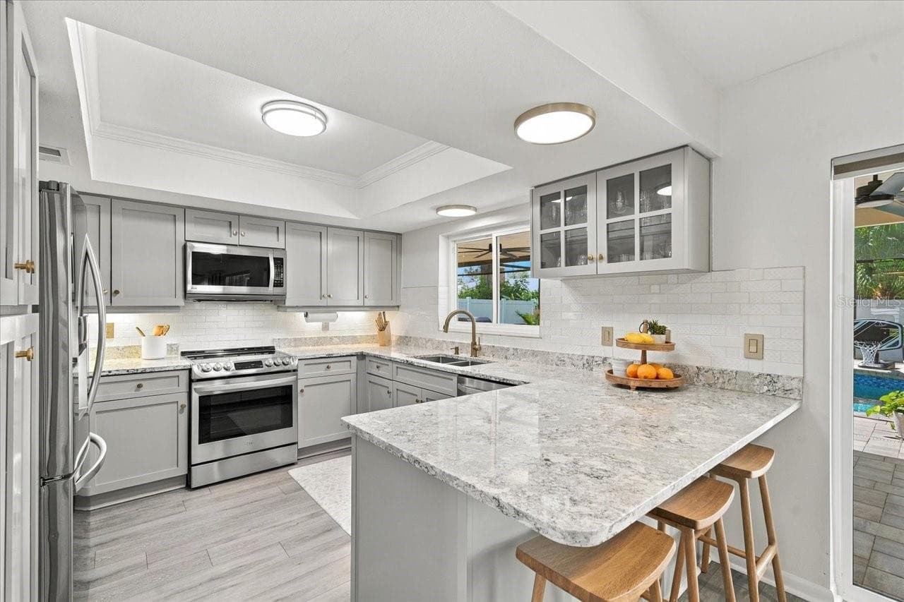 Single Family Residence at 13810 LAKE VILLAGE PL, TAMPA, photo 10 of 45