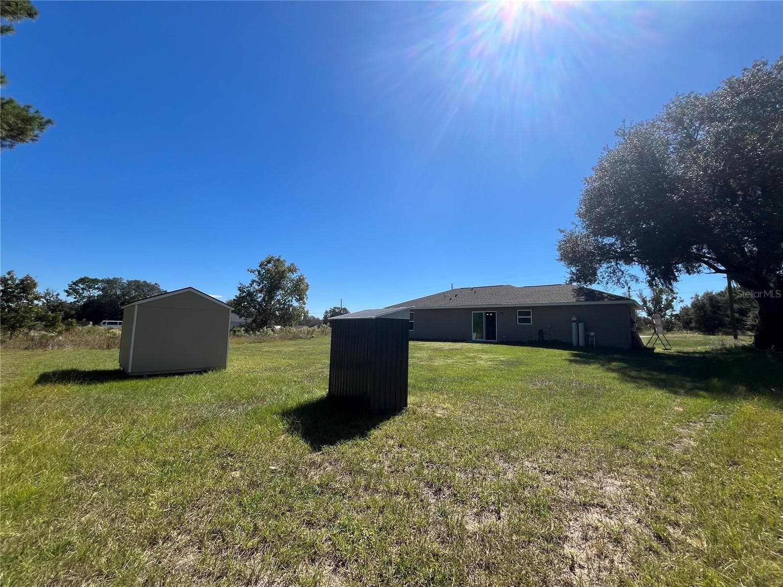 Metal Well Pump House next to Shed in Backyard - 115 MALAUKA RADL, OCKLAWAHA