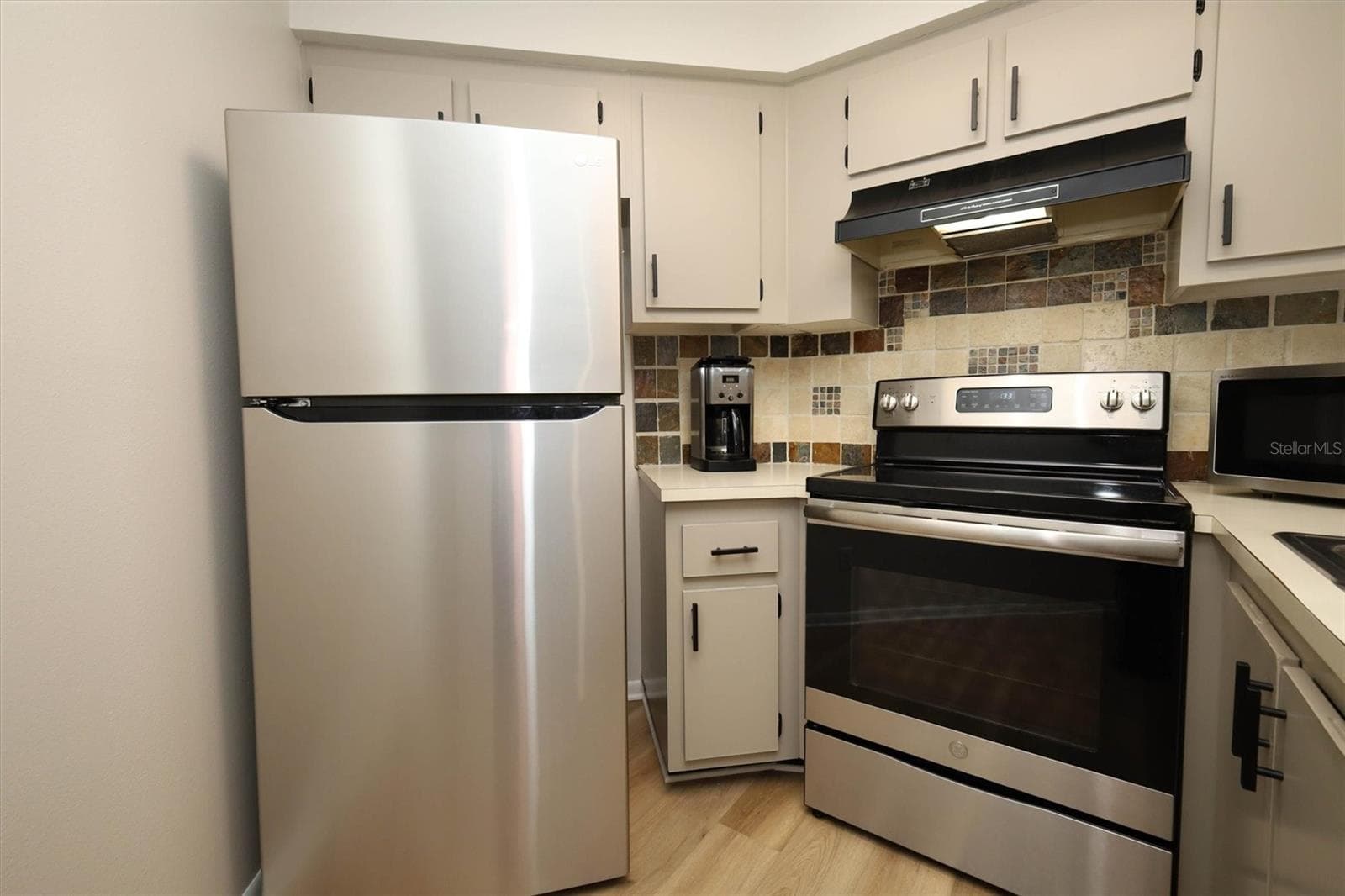 Kitchen with Stainless Applliances - 3823 ATRIUM DR #U-7, ORLANDO