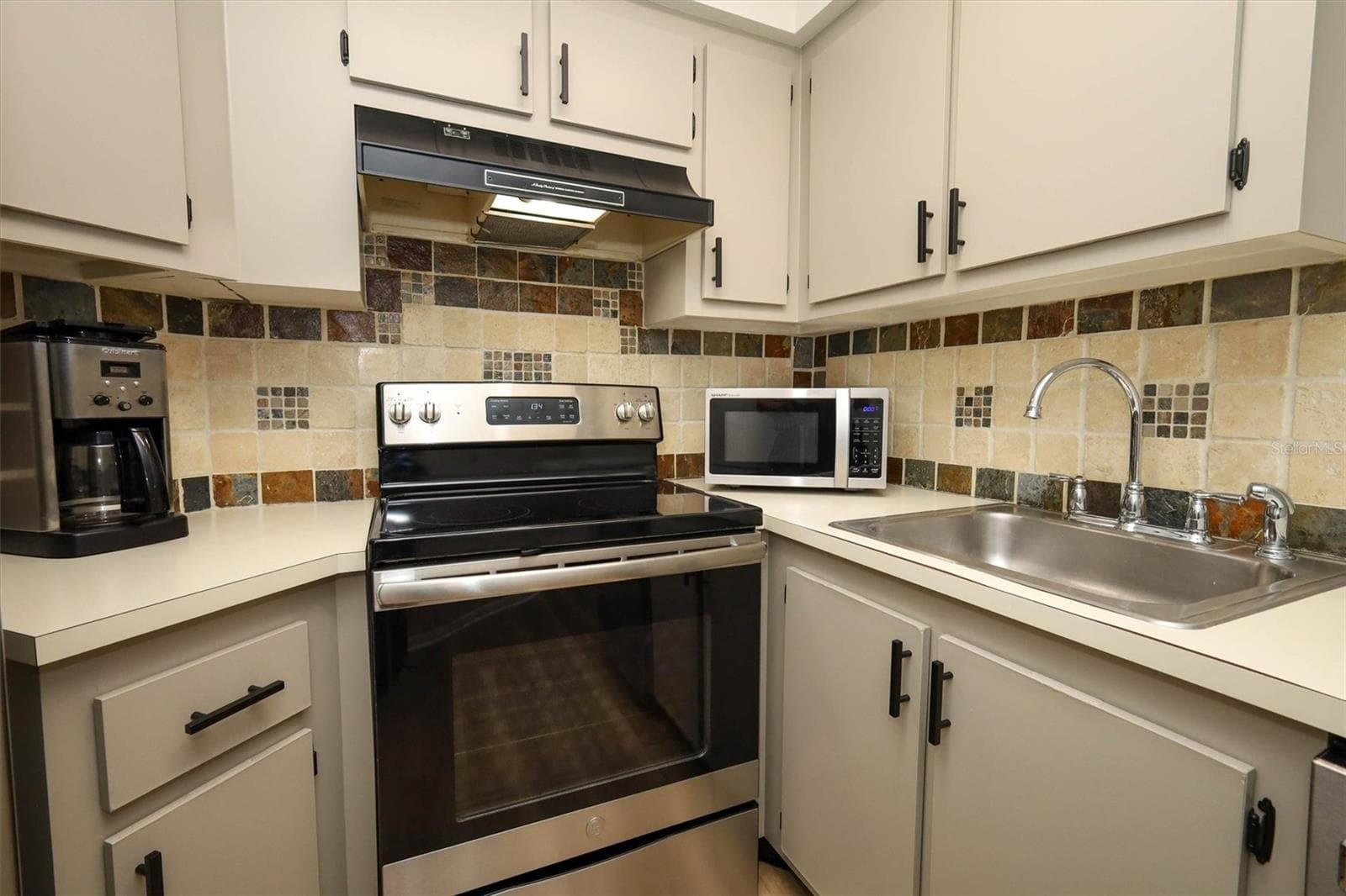 Kitchen with Stainless Applliances - 3823 ATRIUM DR #U-7, ORLANDO