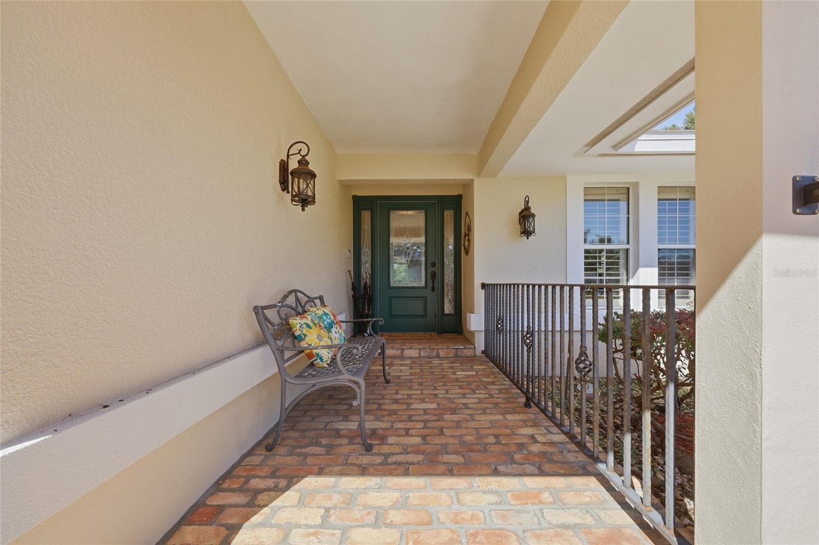 Front entrance of home with porch - 13205 MARIA AVE, CLERMONT