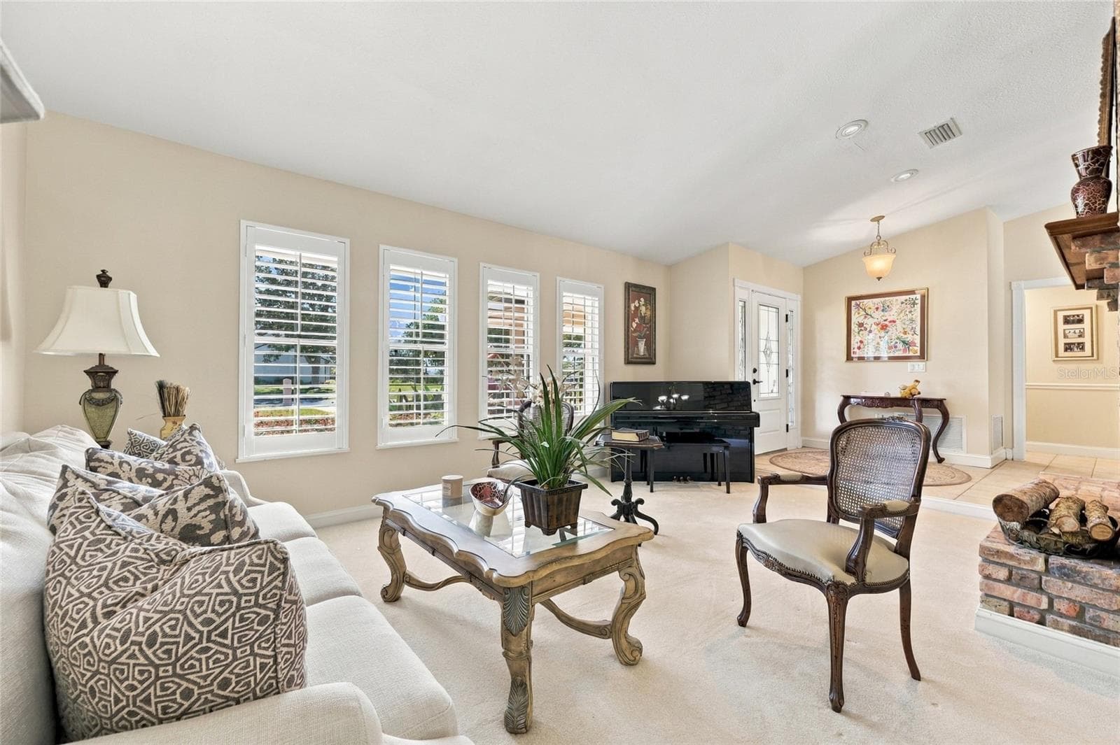 Living Room with plantation shutters - 13205 MARIA AVE, CLERMONT