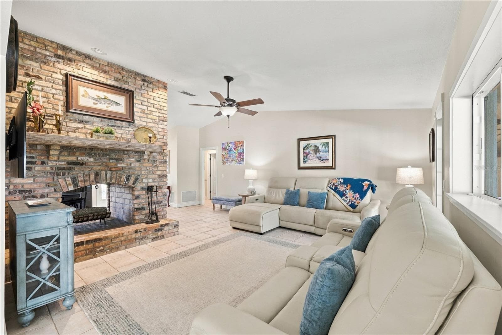 Family room with wood burning fireplace - 13205 MARIA AVE, CLERMONT