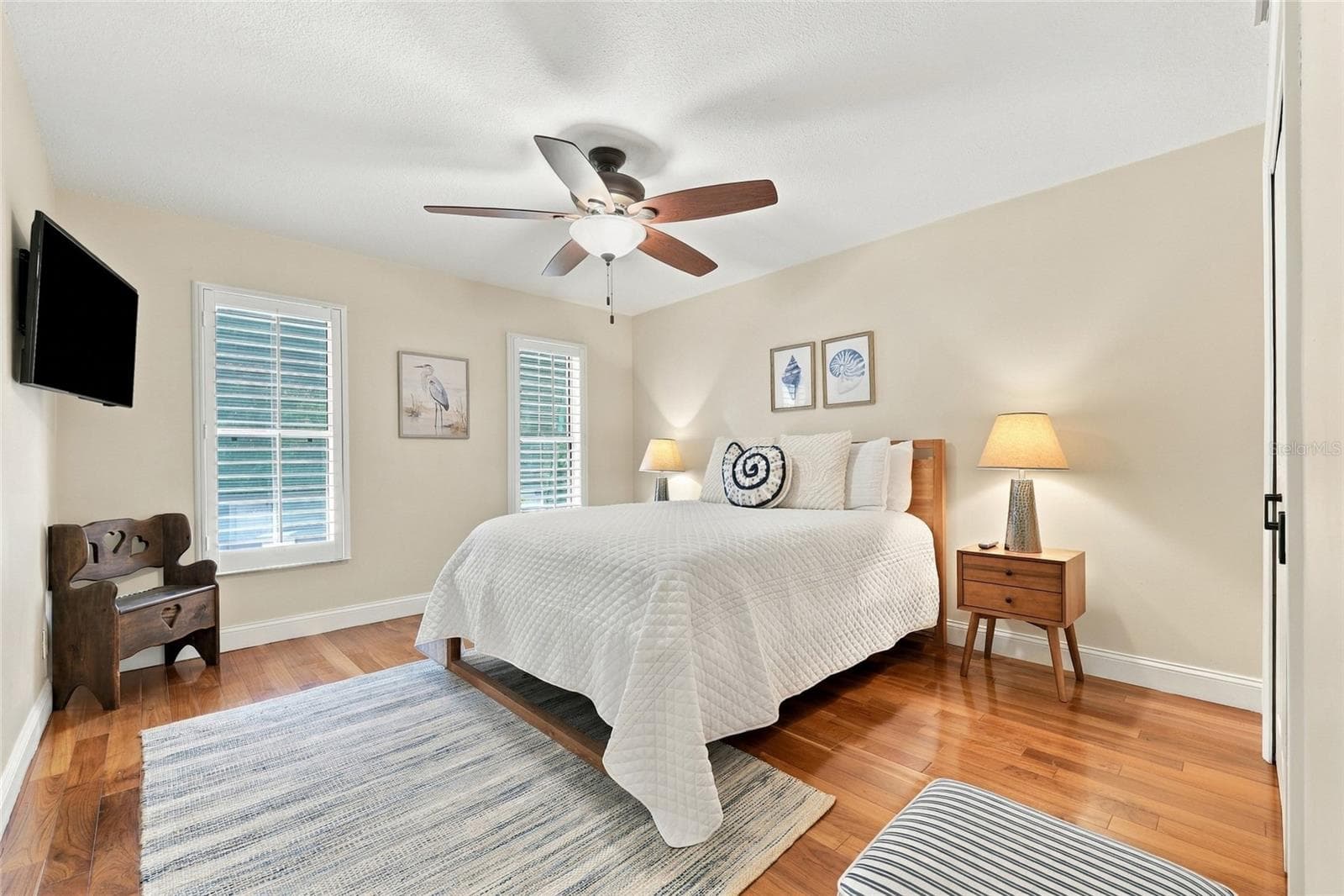 2nd guest bedroom with teak engineered floors & plantation shutters - 13205 MARIA AVE, CLERMONT