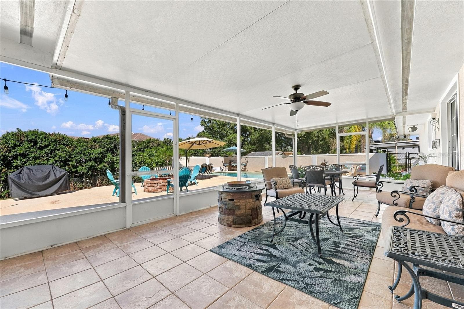 Large tiled & screened in lanai - 13205 MARIA AVE, CLERMONT