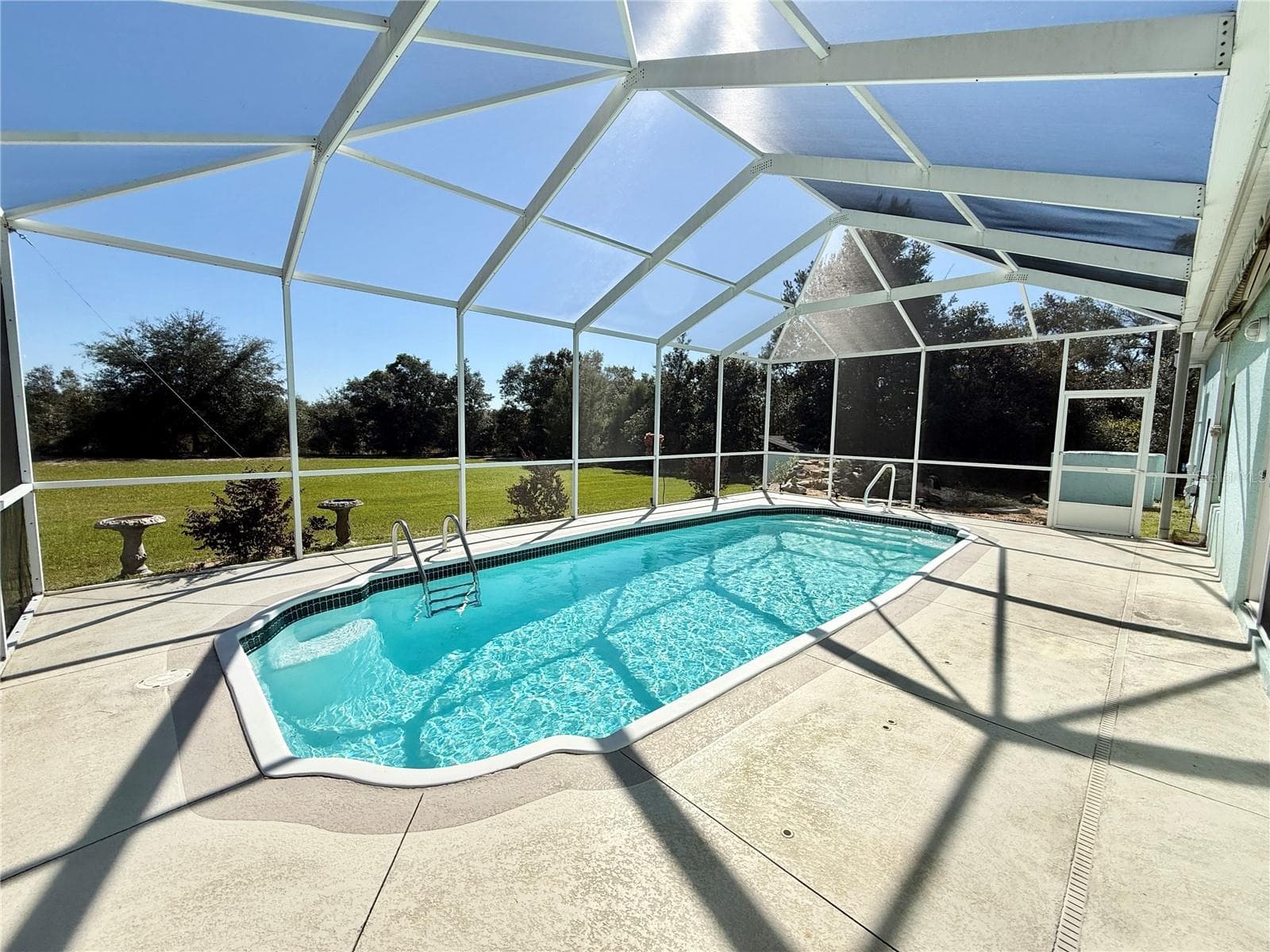 Enclosed pool - 10565 SW 38TH AVE, OCALA