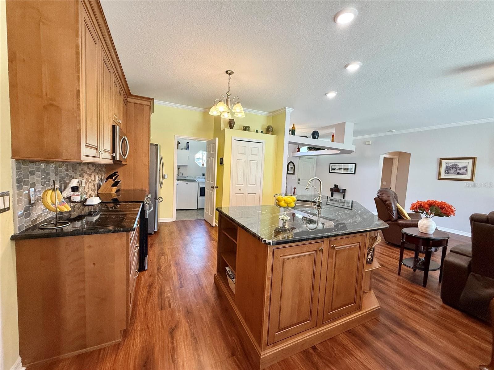 Kitchen with Backsplash-Solid wood cabinets - 10565 SW 38TH AVE, OCALA