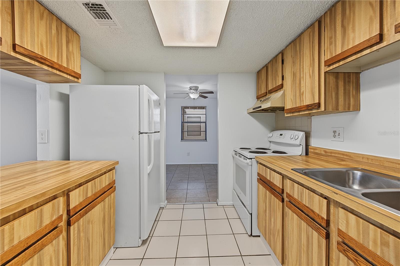 Condominium at 127 CAMPHOR DR #E, OLDSMAR, photo 13 of 45