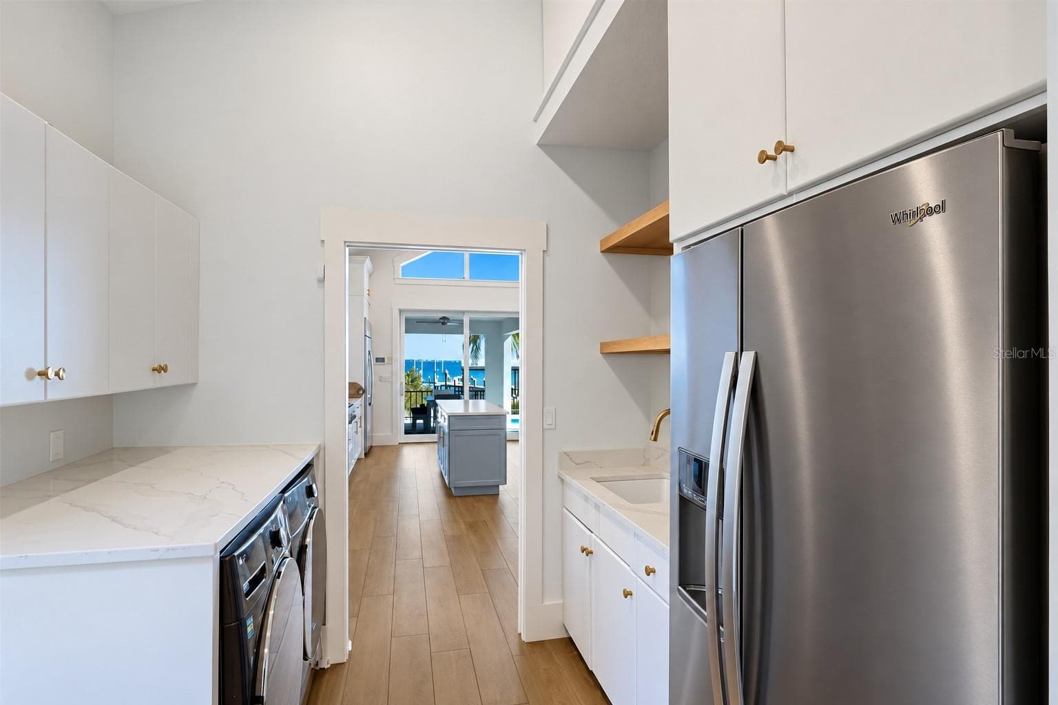 Downstairs utility room and butlers pantry - 1519 RIVERVIEW LN, BRADENTON