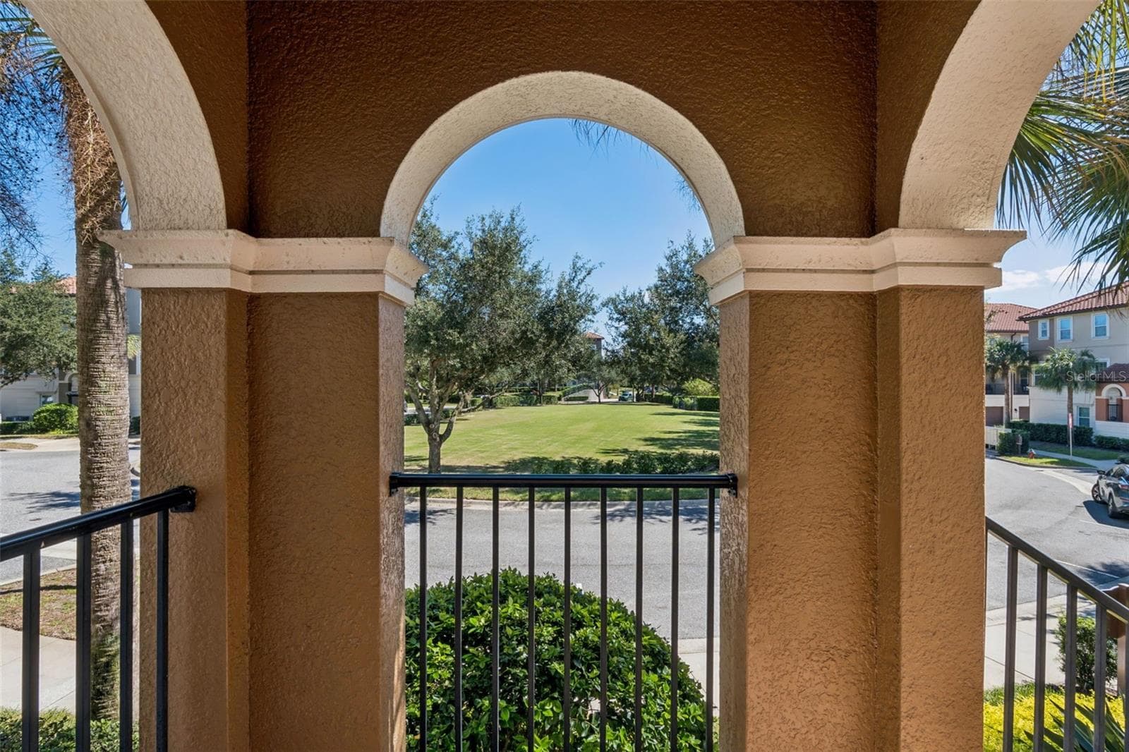 Front entry with park view - 900 LOBELIA DR, LAKE MARY