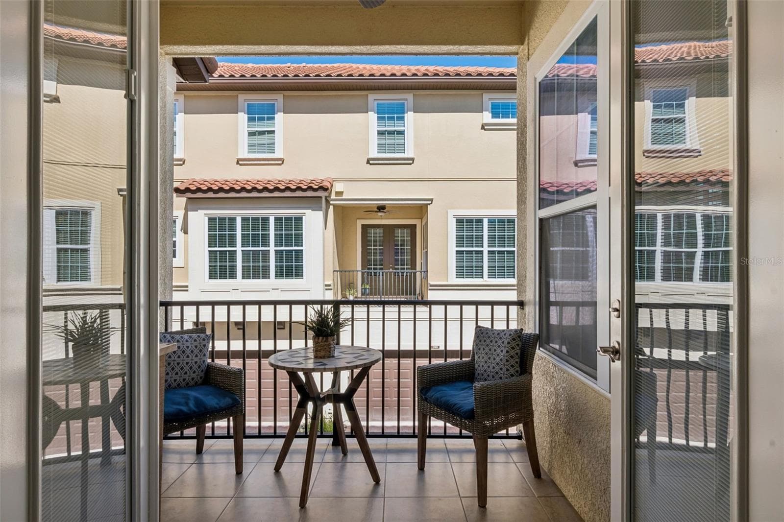Porch with french doors - 900 LOBELIA DR, LAKE MARY