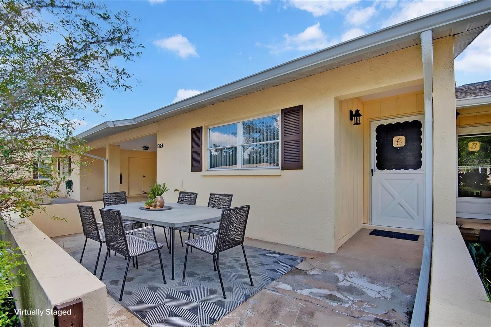Cozy Front Patio-virtually staged - 390 301 BLVD W #10C, BRADENTON