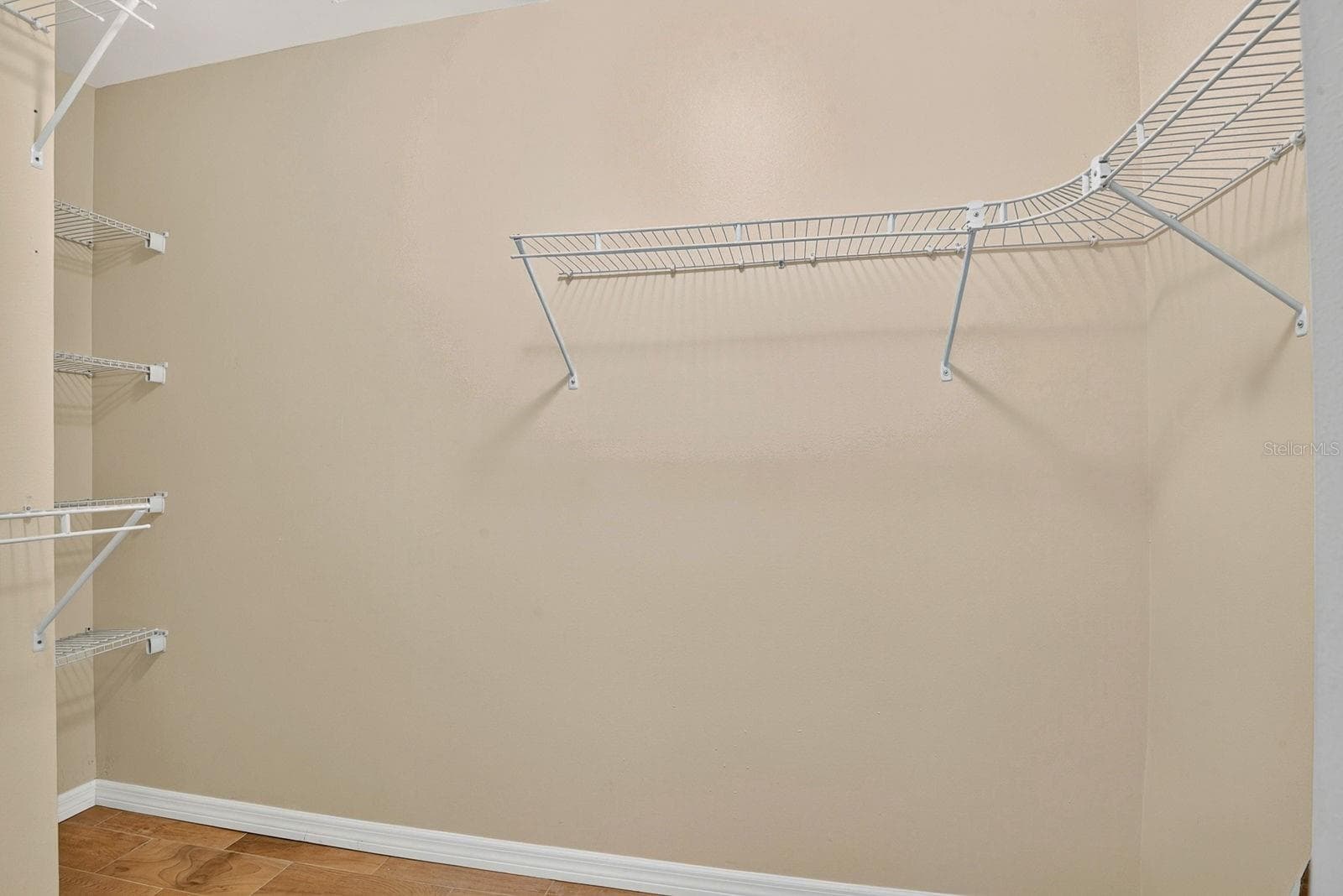 Walk In Closet in Primary Bedroom - 390 301 BLVD W #10C, BRADENTON