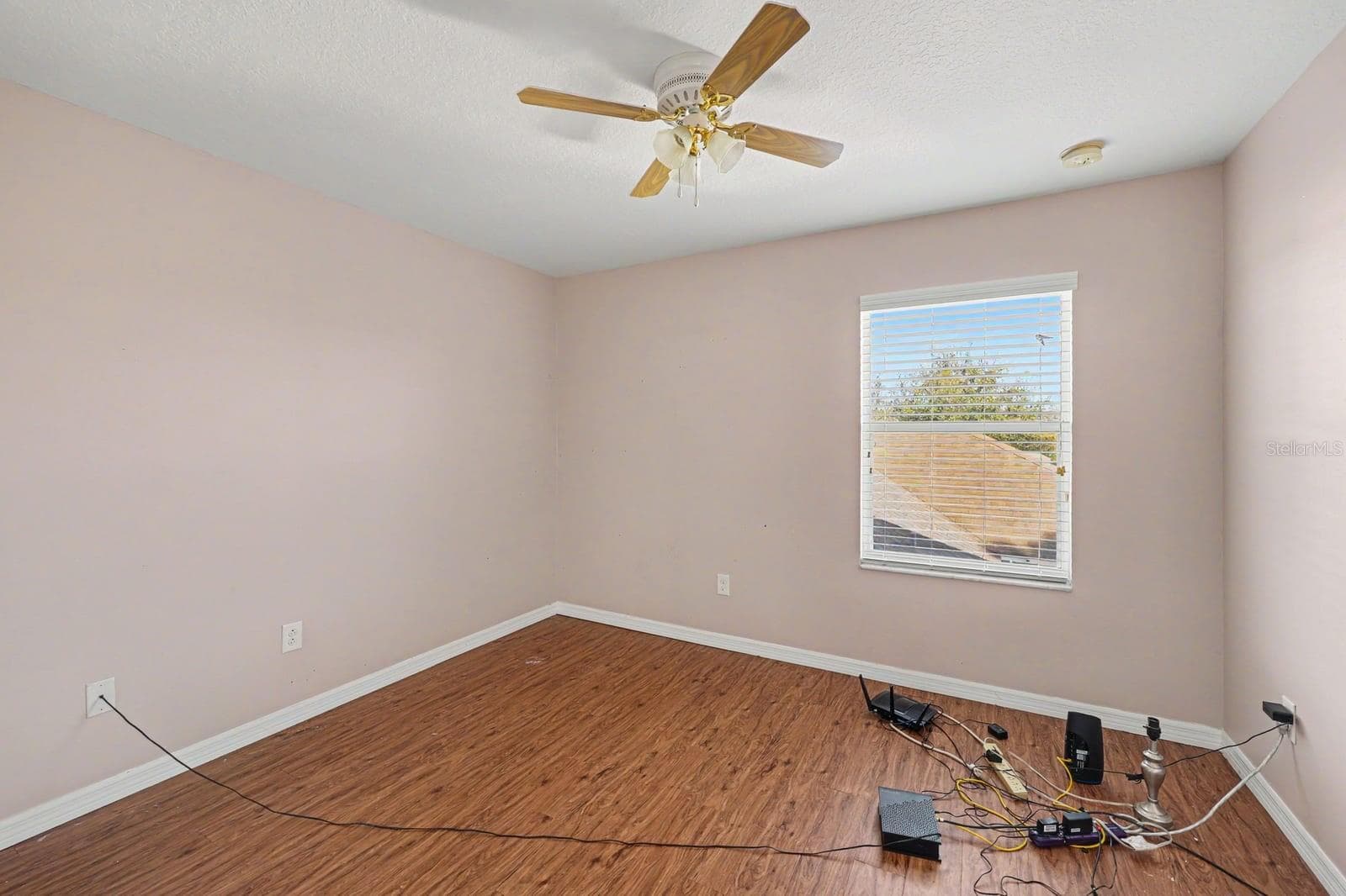 Secondary Bedroom With Pink Walls, Wood Floors & Ceiling Fan - 5705 NEW INDEPENDENCE PKWY, WINTER GARDEN