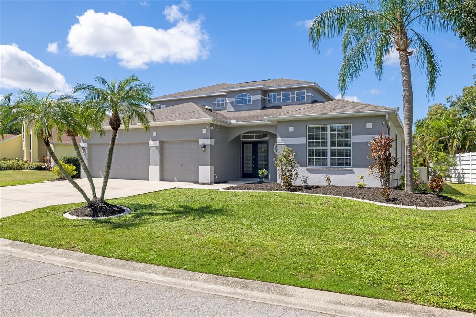 Front Elevation - 3 car garage - 124 41ST CIR E, BRADENTON
