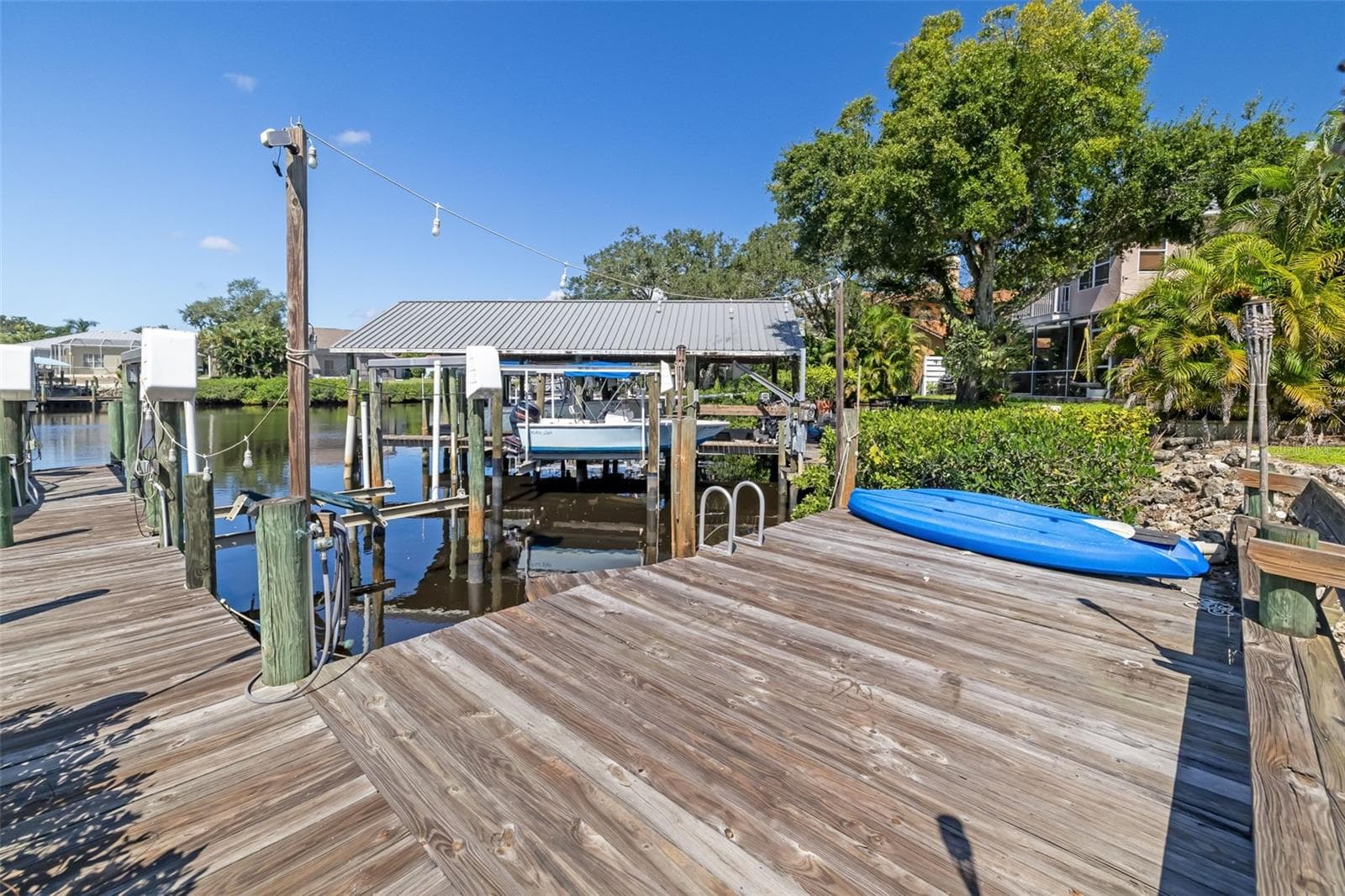 Stairs down to water/floating dock - 124 41ST CIR E, BRADENTON