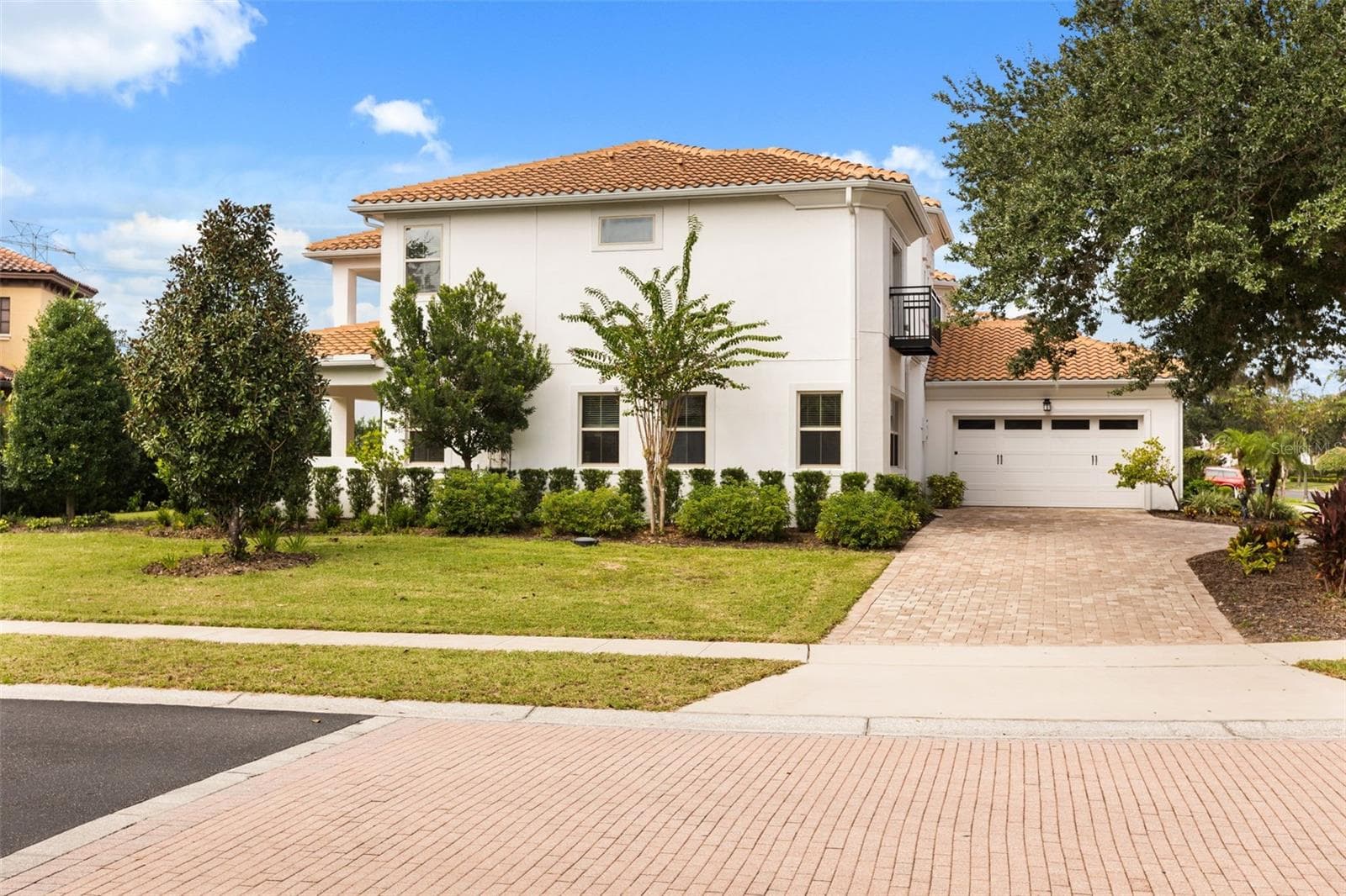 Side Garage View - 5508 EMERSON POINTE WAY, ORLANDO