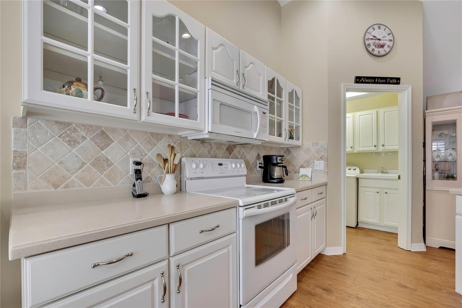 Kitcen with Wood and Glass Cabinets, Corian Counters - 300 HARTFORD CT, SPRING HILL