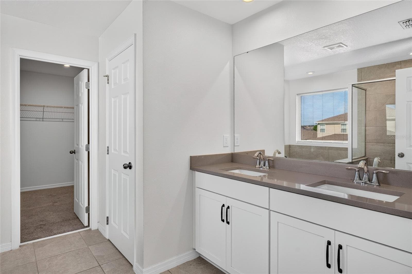 Primary bathroom to closet - 2960 ANGELONIA THORN WAY, CLERMONT