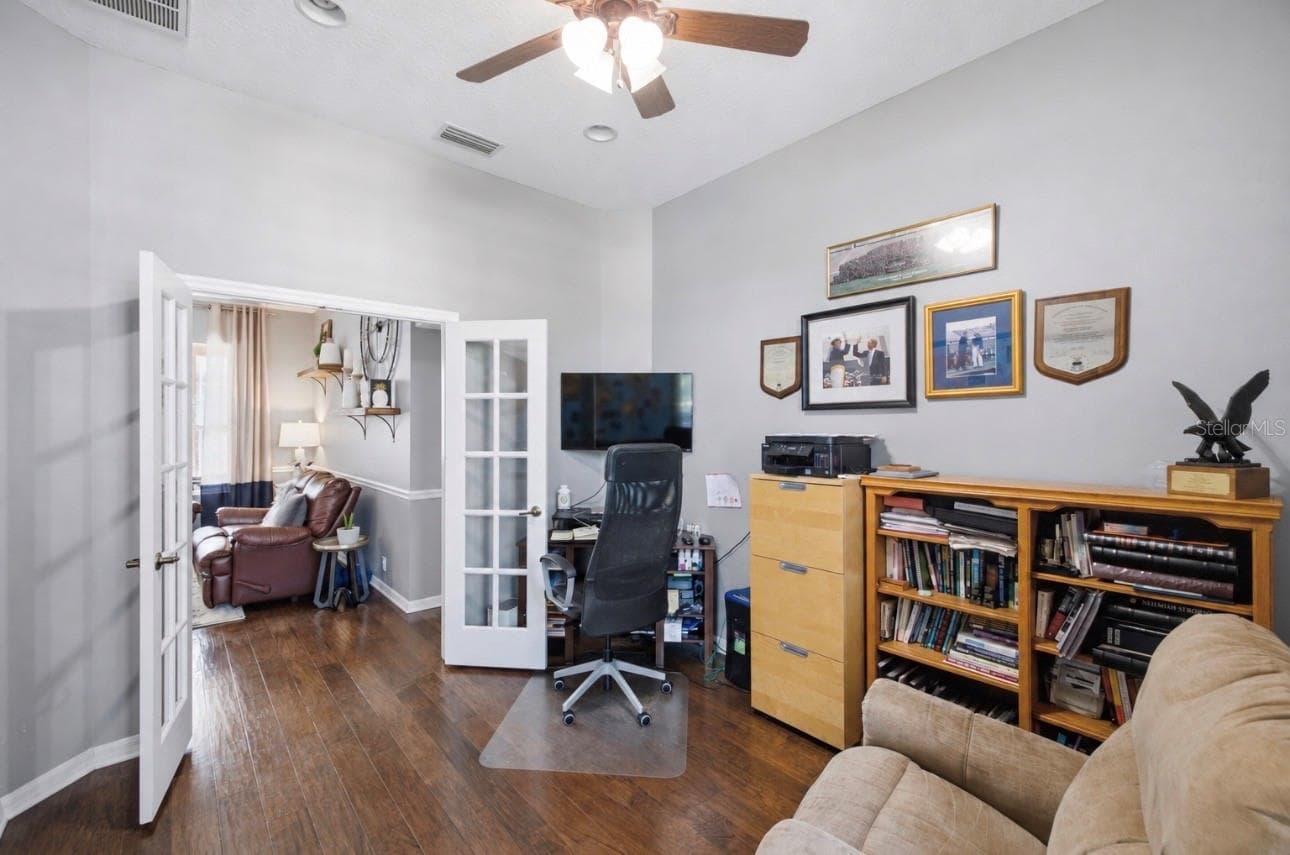 Home Office off of the foyer of the home by the primary suite. - 3905 SORREL VINE DR, WESLEY CHAPEL