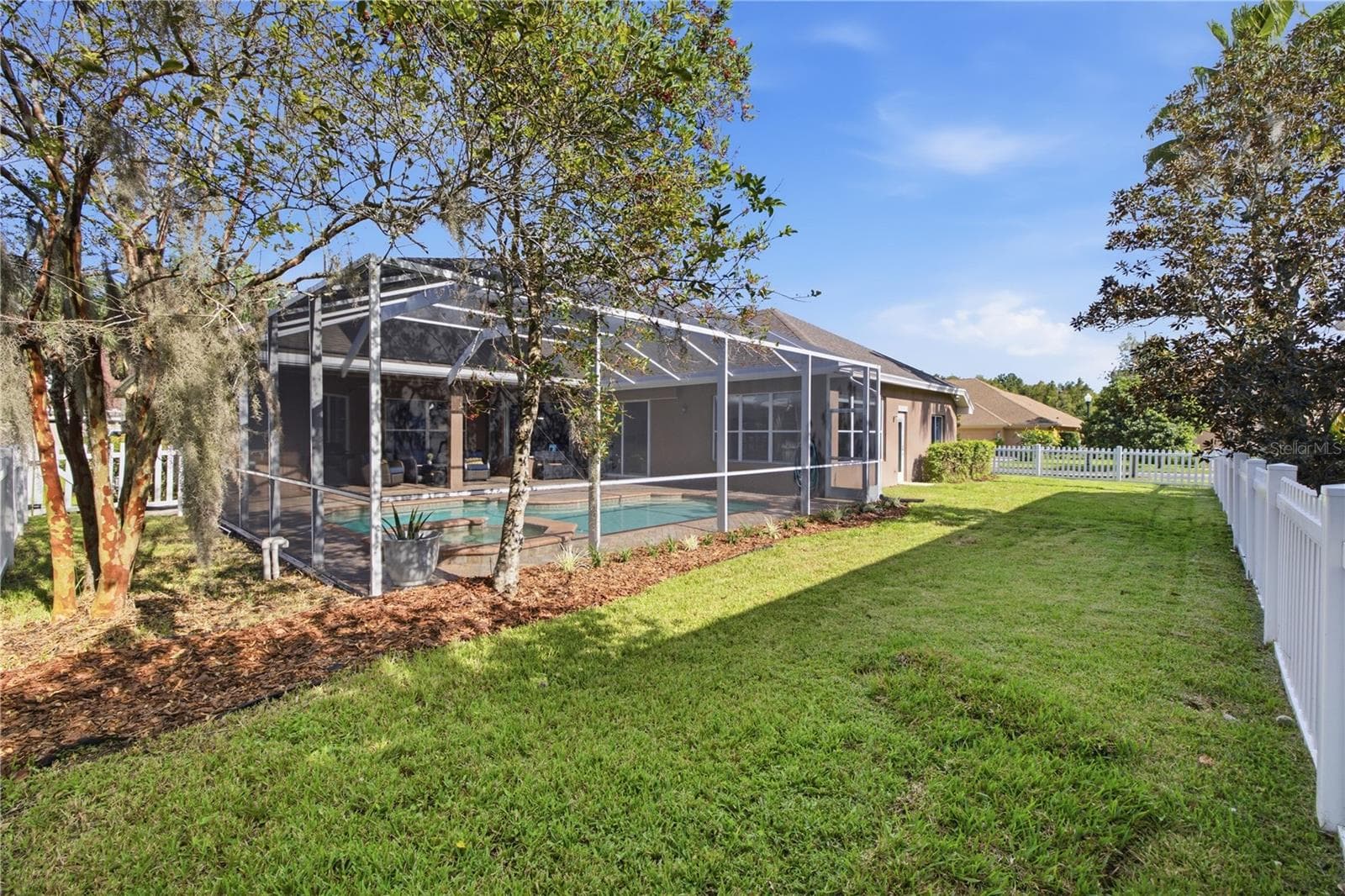 Backyard from side corner rear view, FULLY FENCED - 3905 SORREL VINE DR, WESLEY CHAPEL