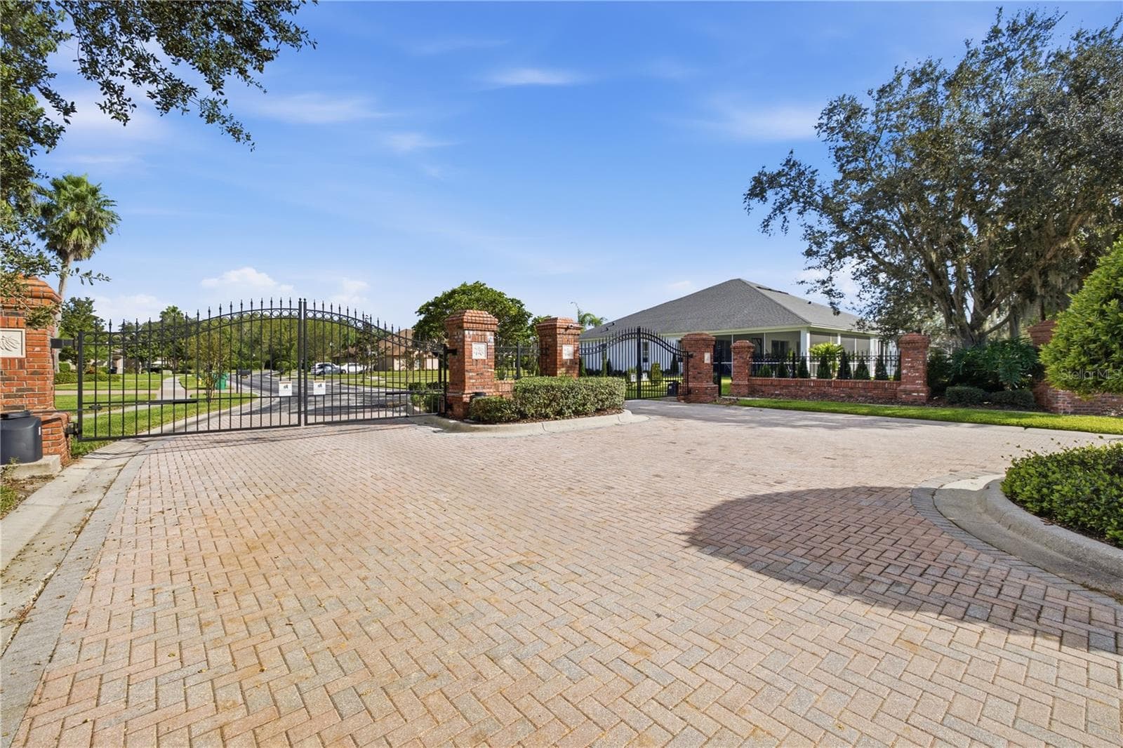 Gated entry into Copperleaf of Seven Oaks - 3905 SORREL VINE DR, WESLEY CHAPEL
