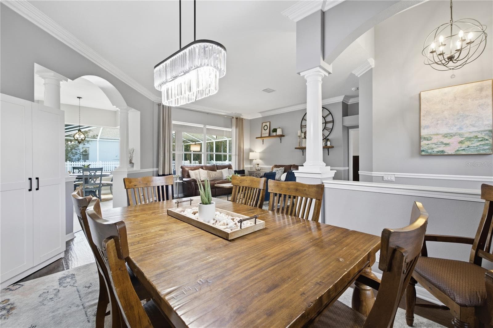 Dining area and upgraded chandelier. - 3905 SORREL VINE DR, WESLEY CHAPEL