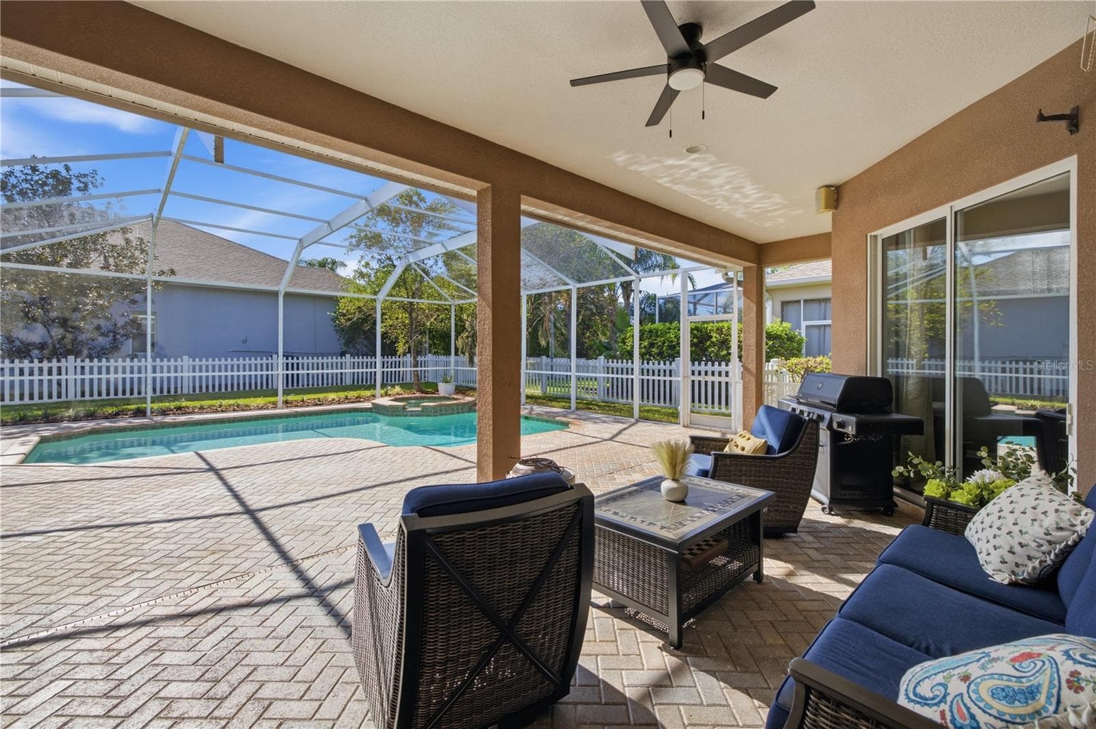 Covered entertainment and dining area. - 3905 SORREL VINE DR, WESLEY CHAPEL