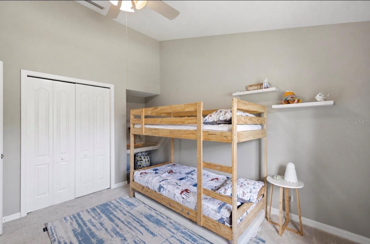 Bedroom #1- custom closet system behind closet doors. - 3905 SORREL VINE DR, WESLEY CHAPEL
