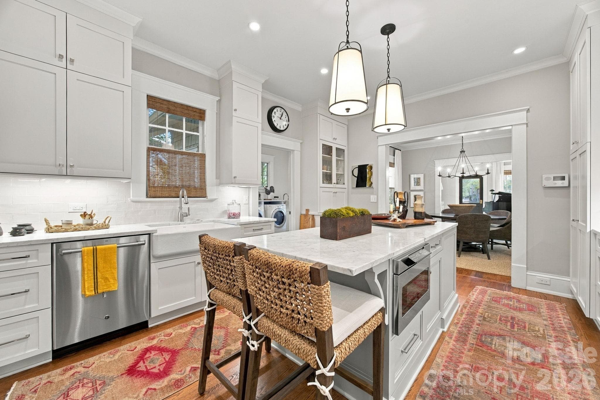 Beautiful kitchen island with seating and a built-in microwave - 1912 Park Road, Charlotte