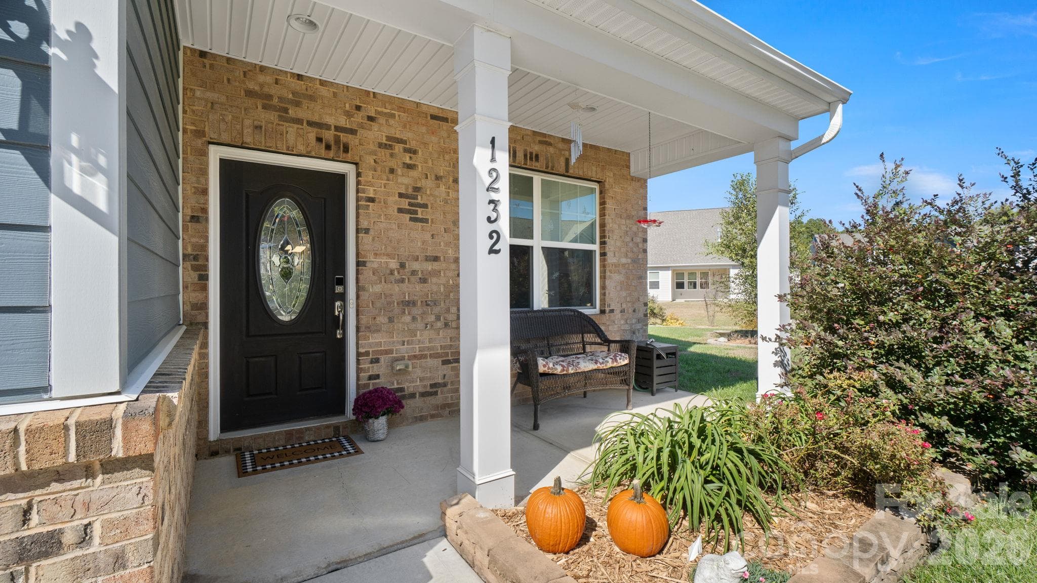 Welcoming covered front porch - 1232 New River Drive, Concord
