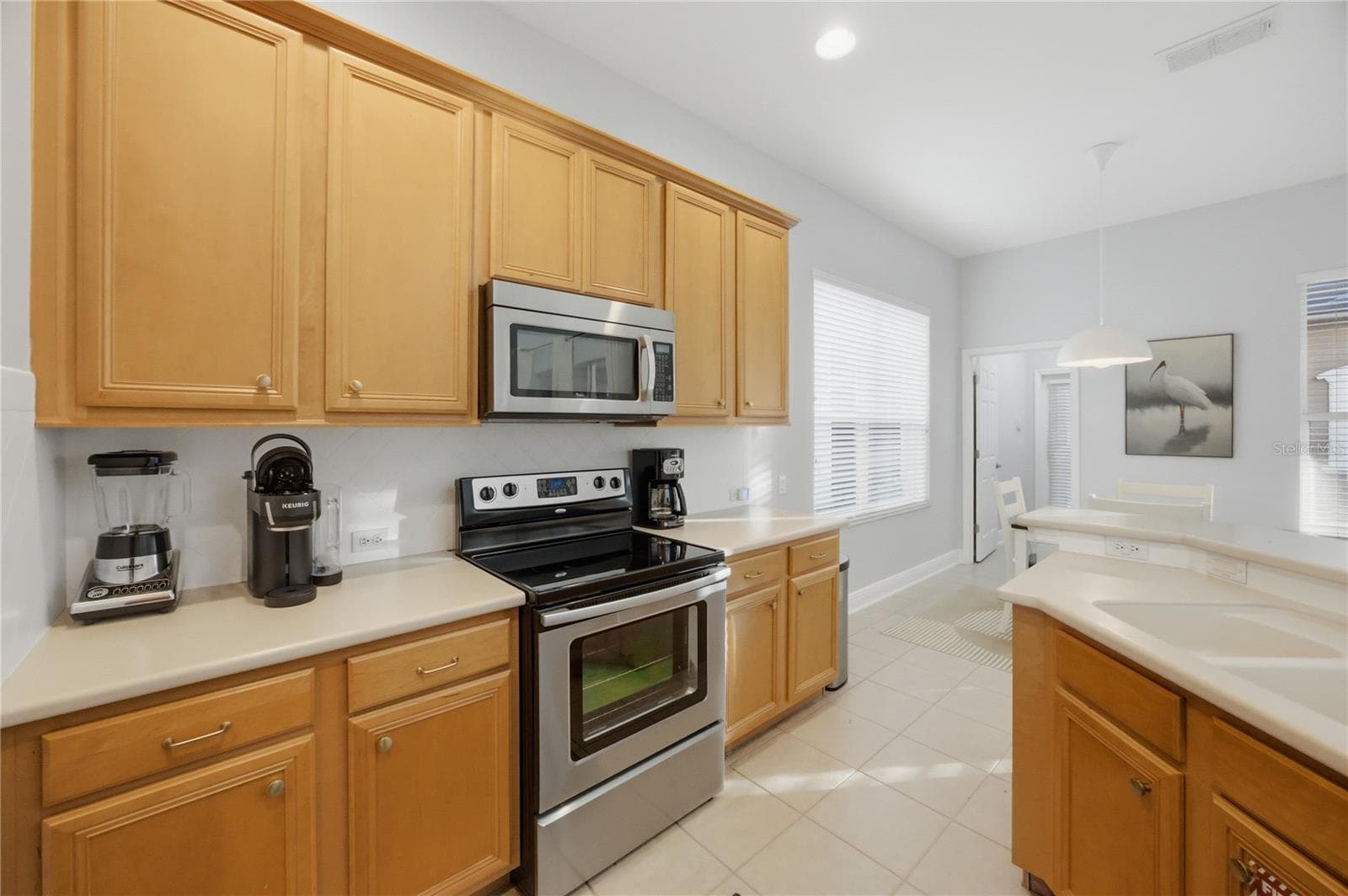 Single Family Residence at 7402 SOIREE WAY, REUNION, photo 9 of 49
