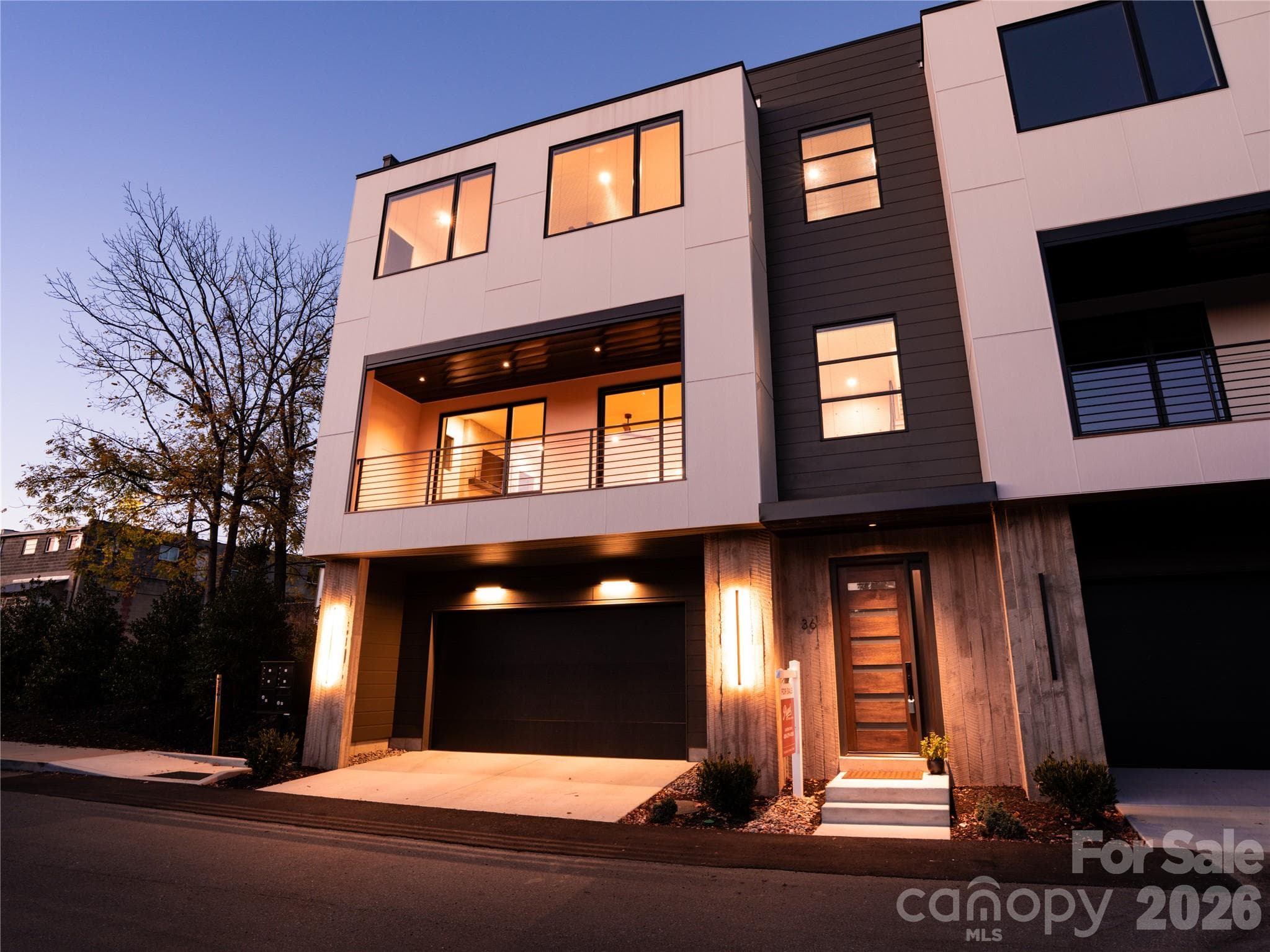 Front elevation at dusk - 36 S Johnson Street, Brevard