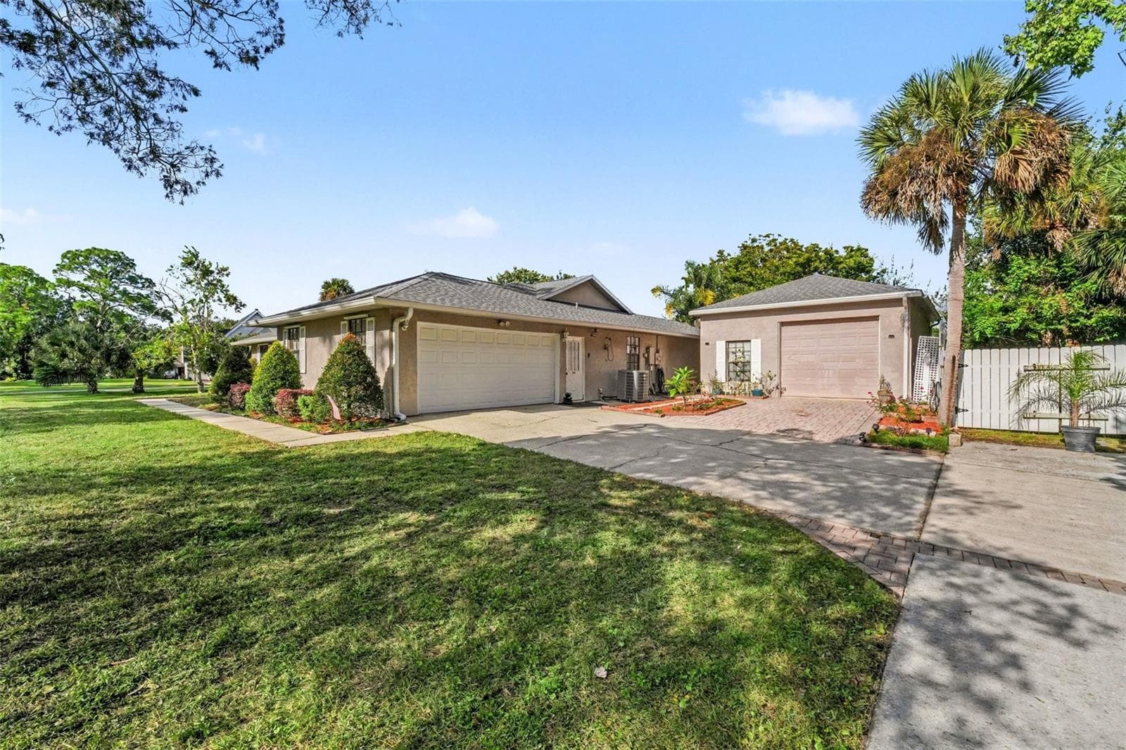 driveway and garages - 7366 WINDOVER WAY, TITUSVILLE