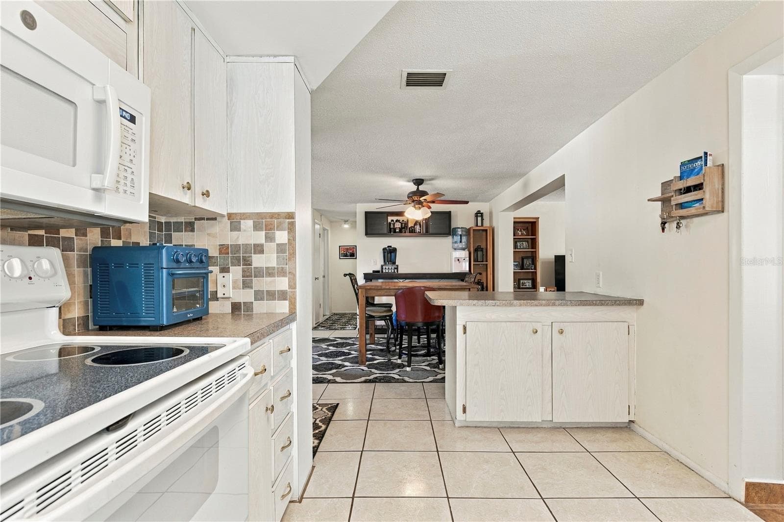 Single Family Residence at 1042 VIKING DR, HOLIDAY, photo 13 of 50